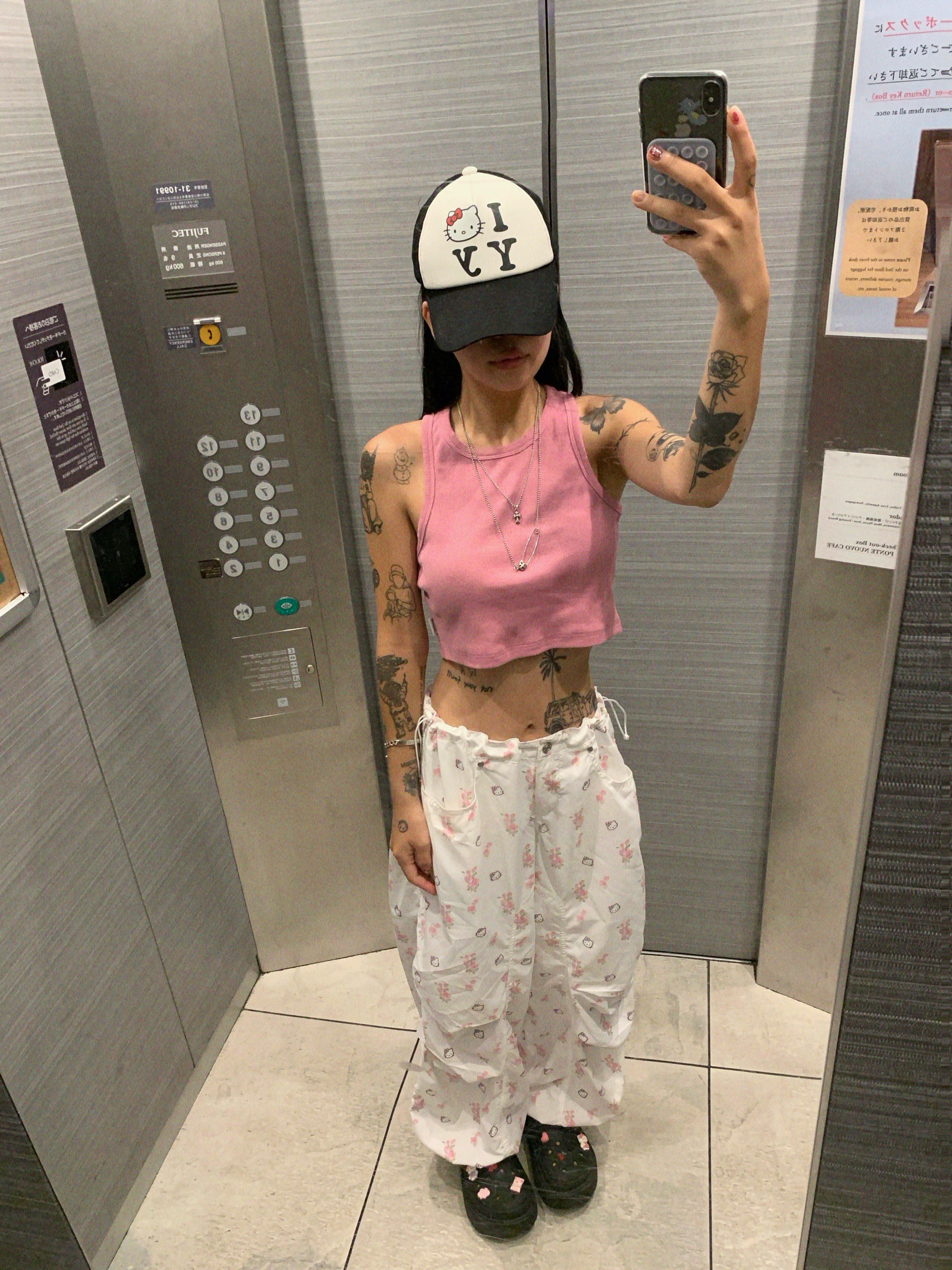 Open Yy x Hello Kitty Trucker Cap Black, Open Yy x Hello Kitty Parachute Pants White 착용 스타일