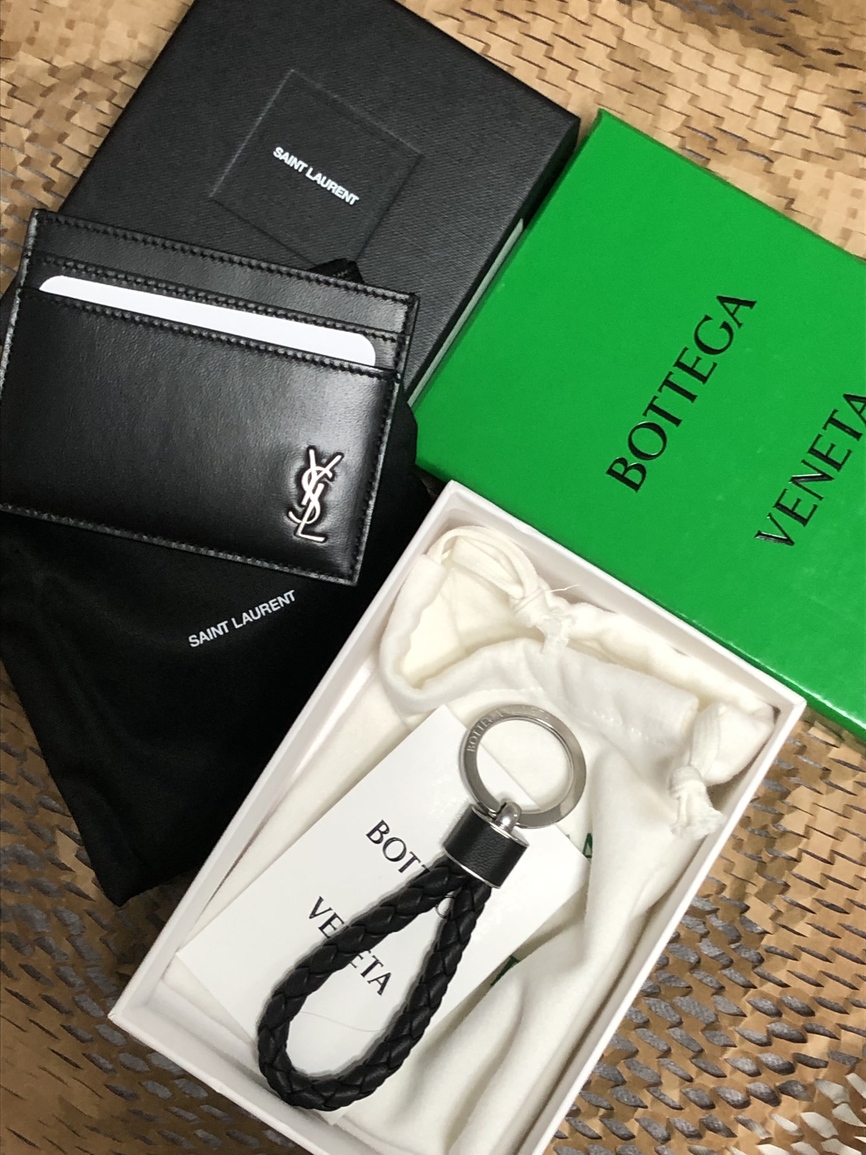 Saint Laurent Tiny Silver Monogram Card Case in Matte Leather Black, Bottega Veneta Intreccio Keyring Black 착용 스타일