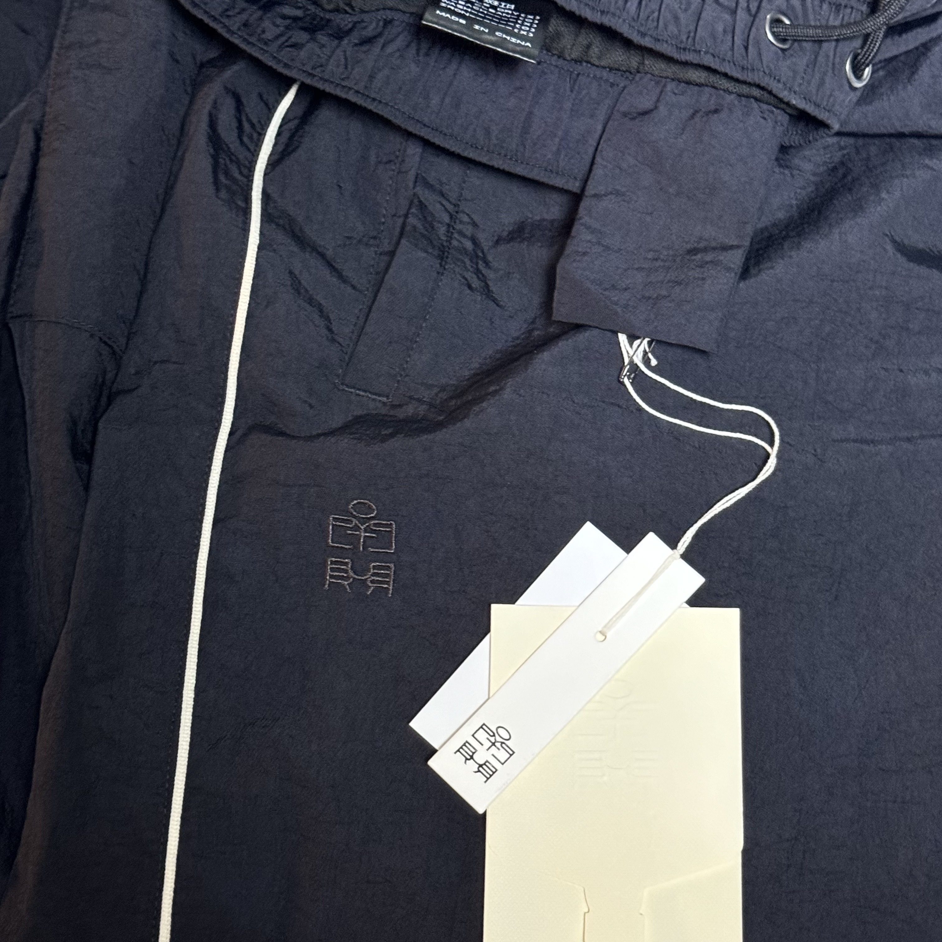 Polyteru Human Index Index Track Pants Dark Navy/White 착용 스타일