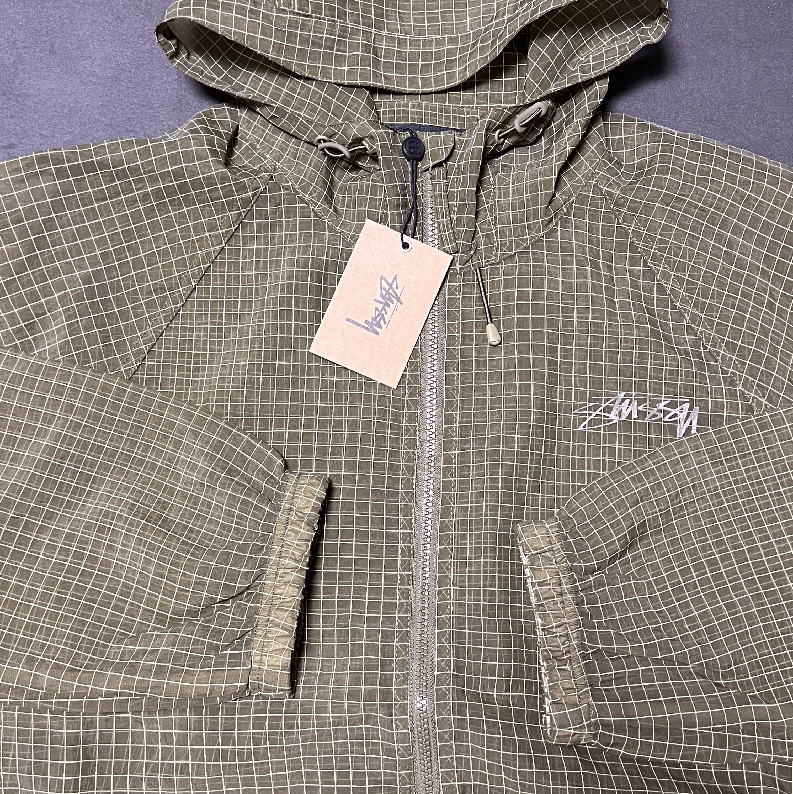 Stussy Beach Shell Transparent Ripstop Olive 착용 스타일 - 1