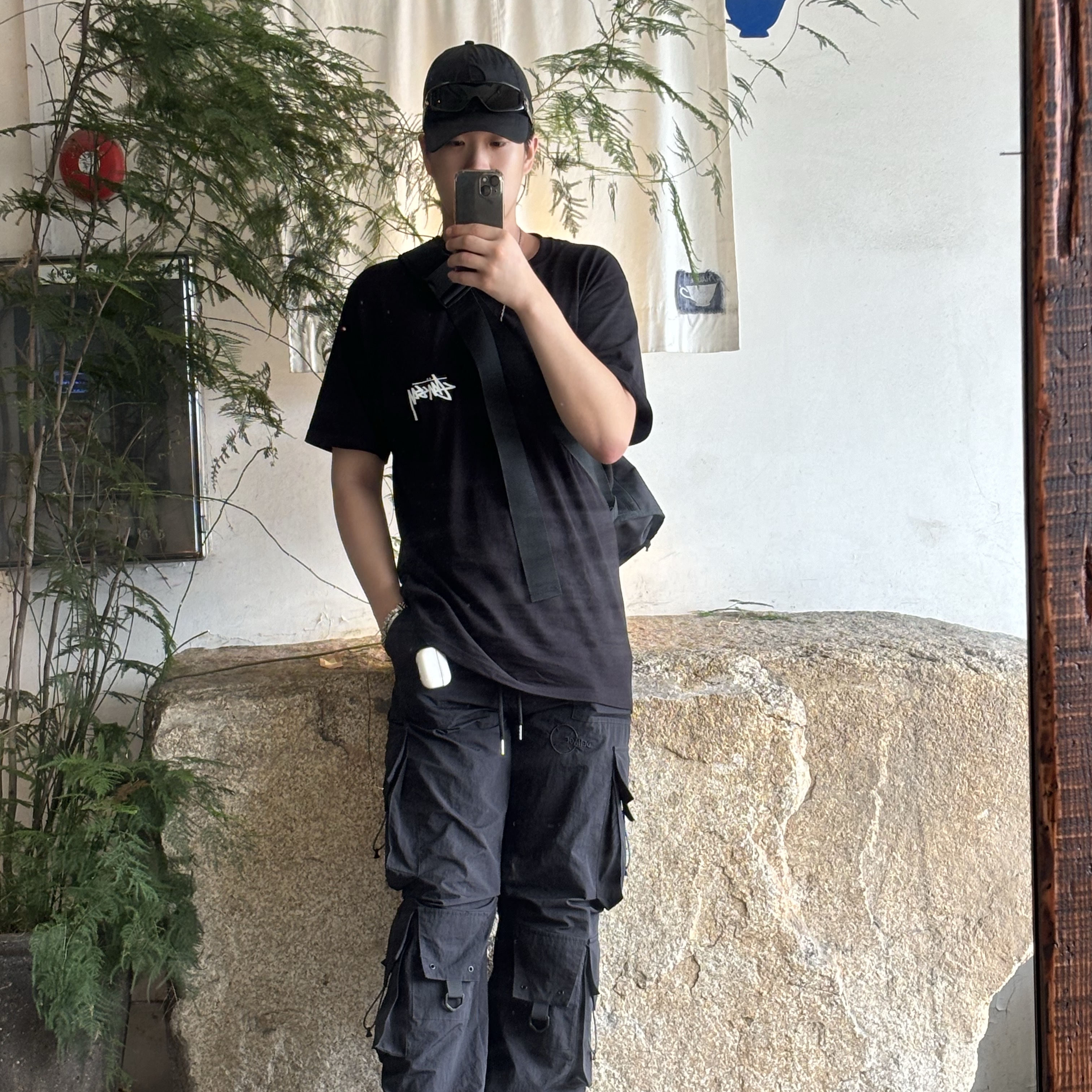 Stussy x Our Legacy x Denim Tears Stockholm T-Shirt Black 착용 스타일