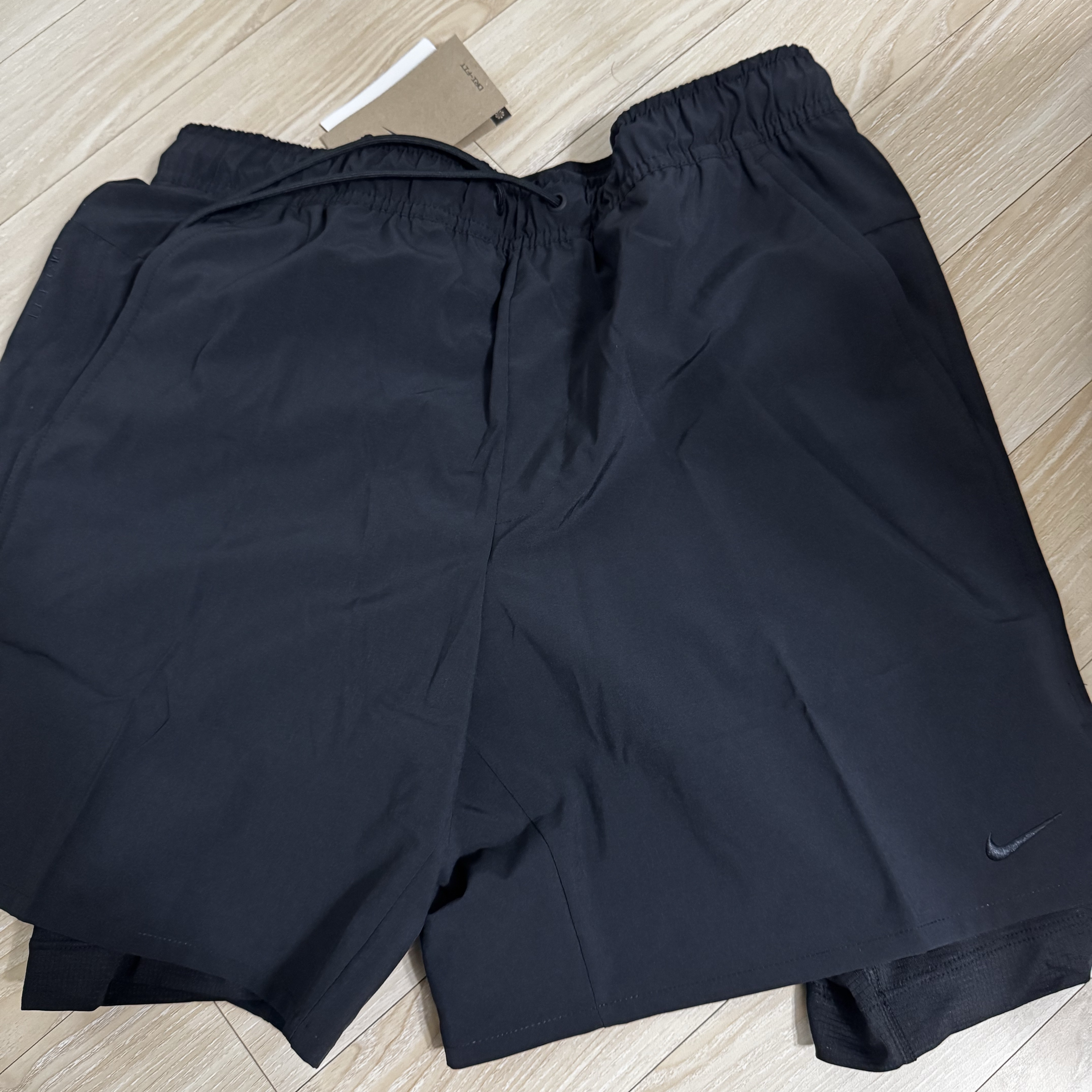 Nike Dri-Fit Unlimited 7 Inch 2 in 1 Versatile Shorts Black - Asia 착용 스타일 - 1