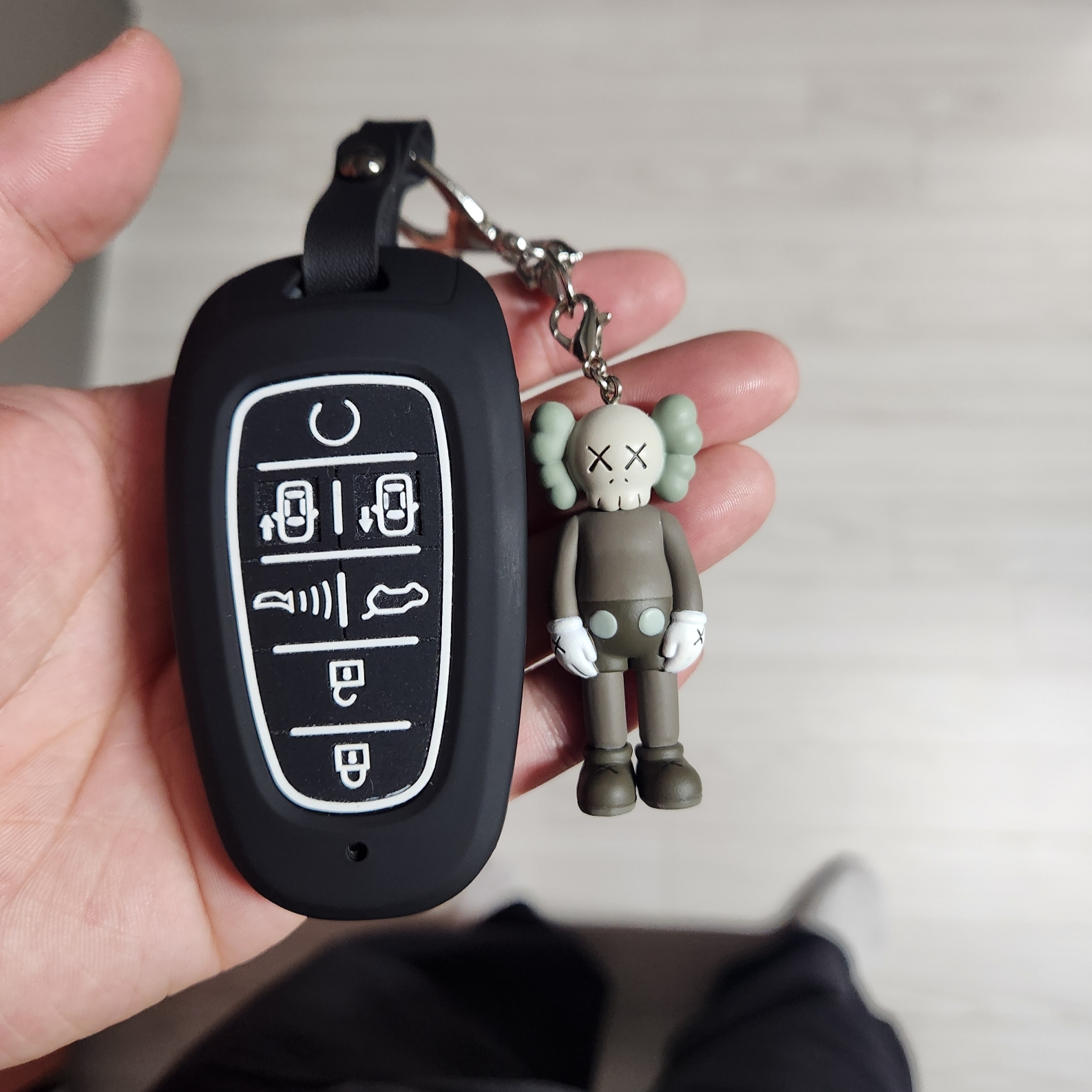 Kaws Tokyo First Companion Keychain Brown 착용 스타일