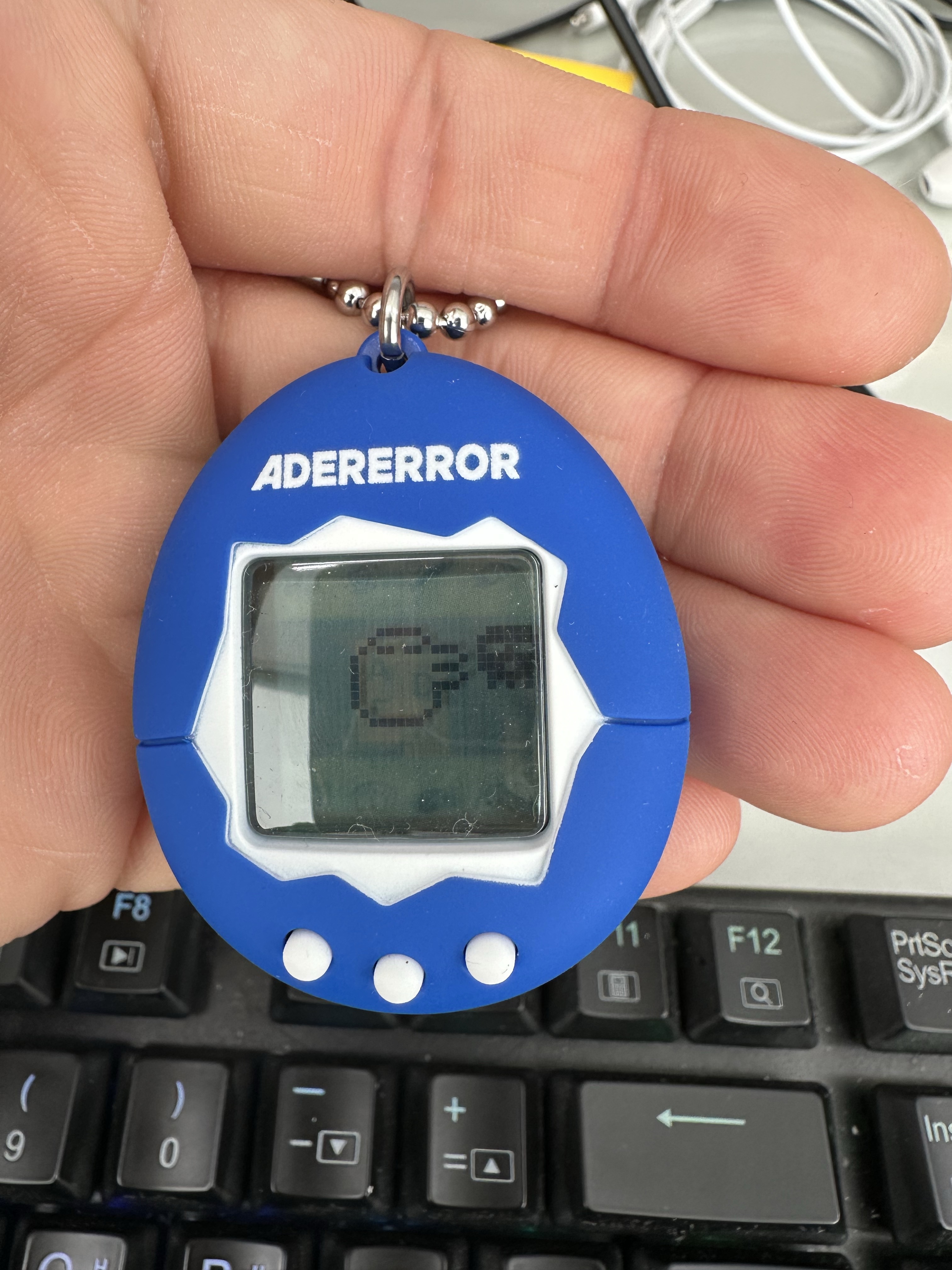 Ader Error x Bandai Original Tamagotchi Z-Blue 착용 스타일