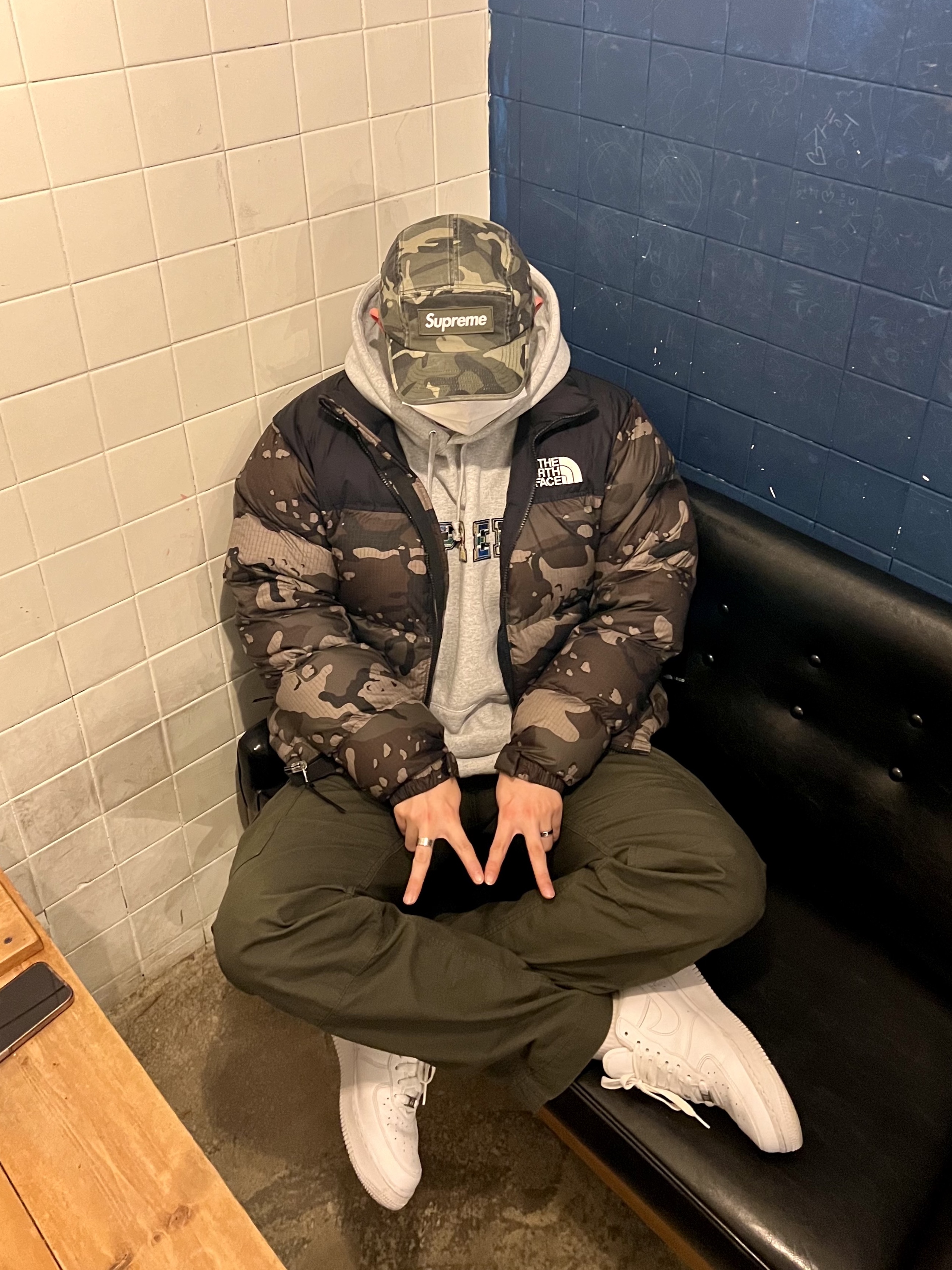 The North Face 1996 Novelty Nuptse Jacket Woodland Camo, Supreme Military Camp Cap Olive Camo - 23SS 착용 스타일