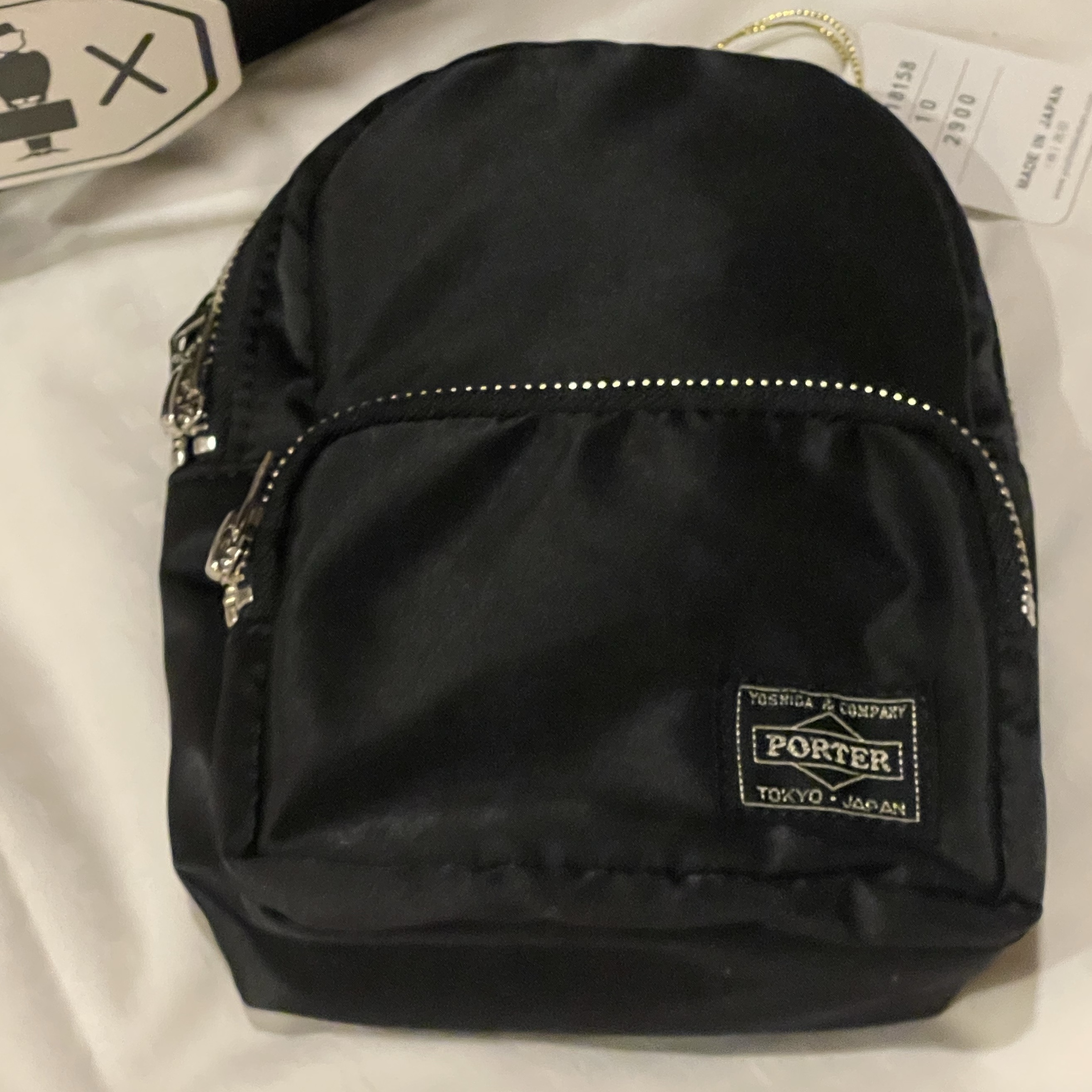 Porter Howl Daypack Mini Black, BAPE Ape Head Coin Case M Brown 착용 스타일 - 2