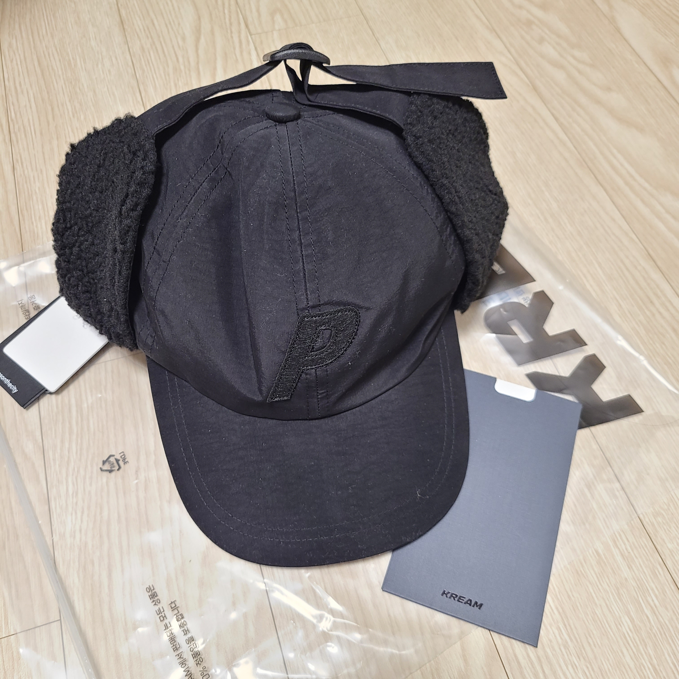 Palace x C.P. Company Goggle Ear Flap P-Cap Black - 23FW 착용 스타일 - 1