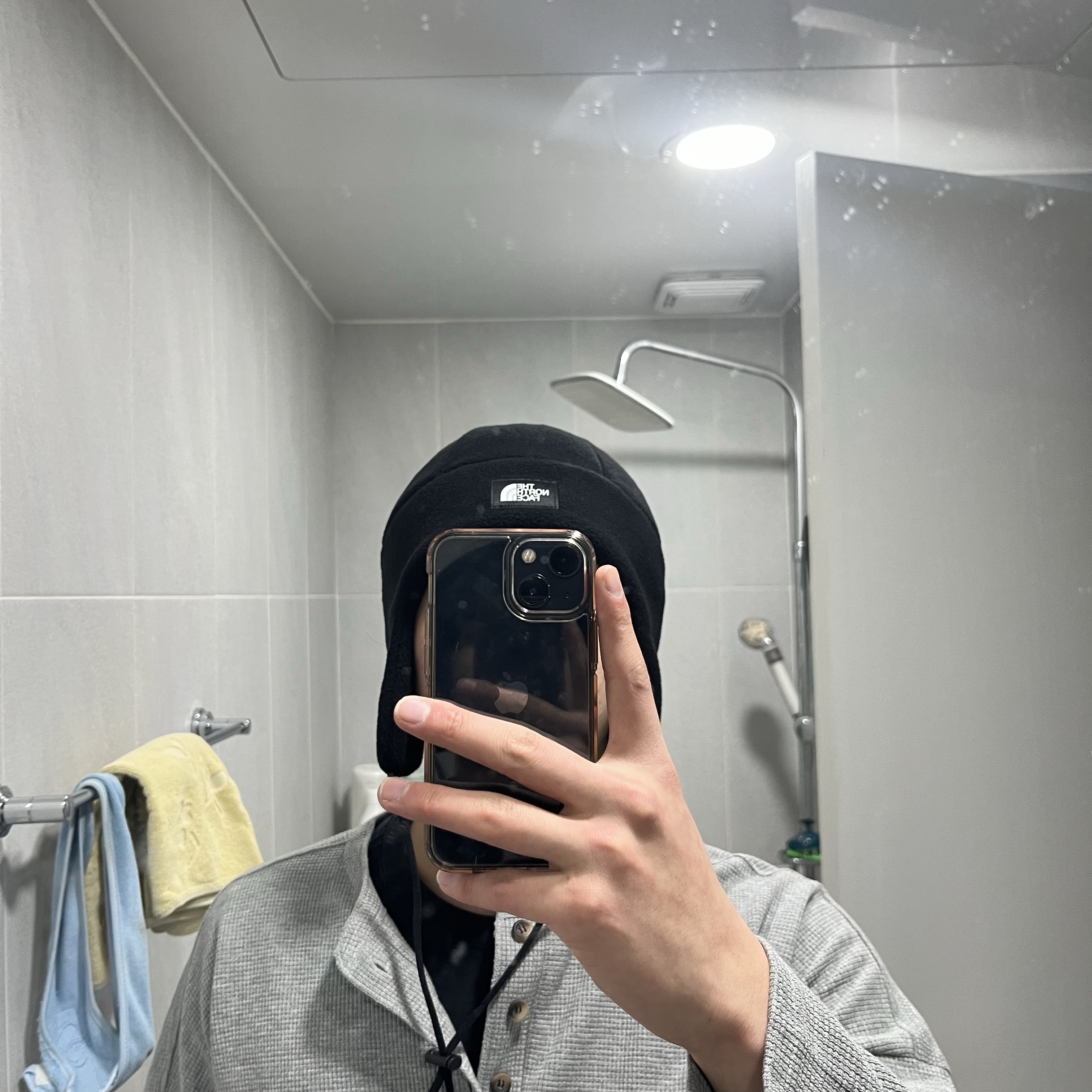 The North Face Fleece Earmuff Beanie Black 착용 스타일