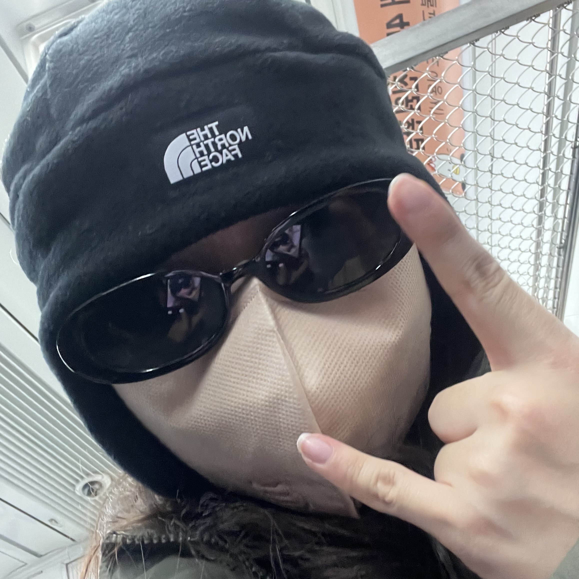 The North Face Fleece Earmuff Beanie Black 착용 스타일