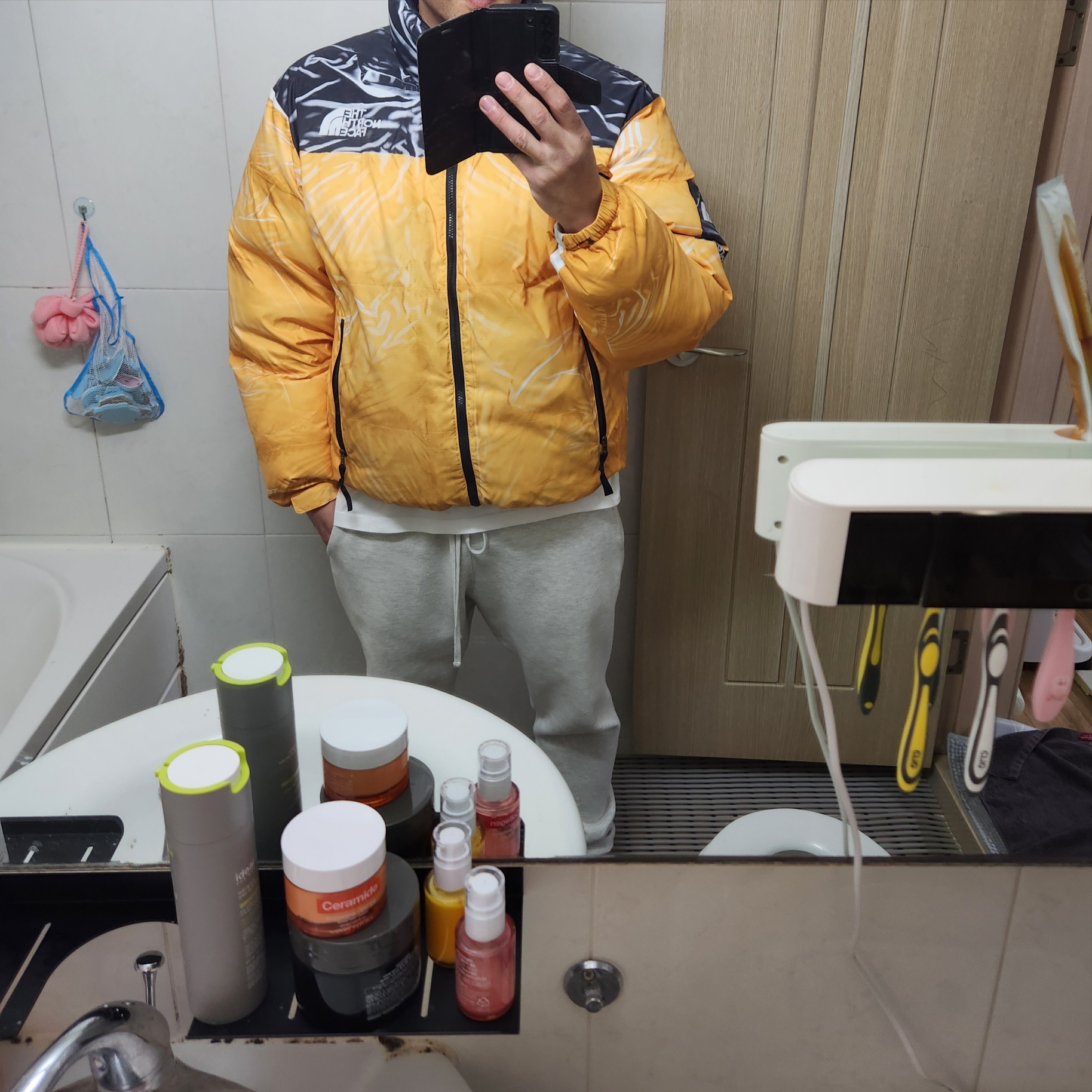 Supreme x The North Face Trompe L’oeil Printed Nuptse Jacket Yellow - 23SS, Essentials Sweatpants Oatmeal - 21SS 착용 스타일