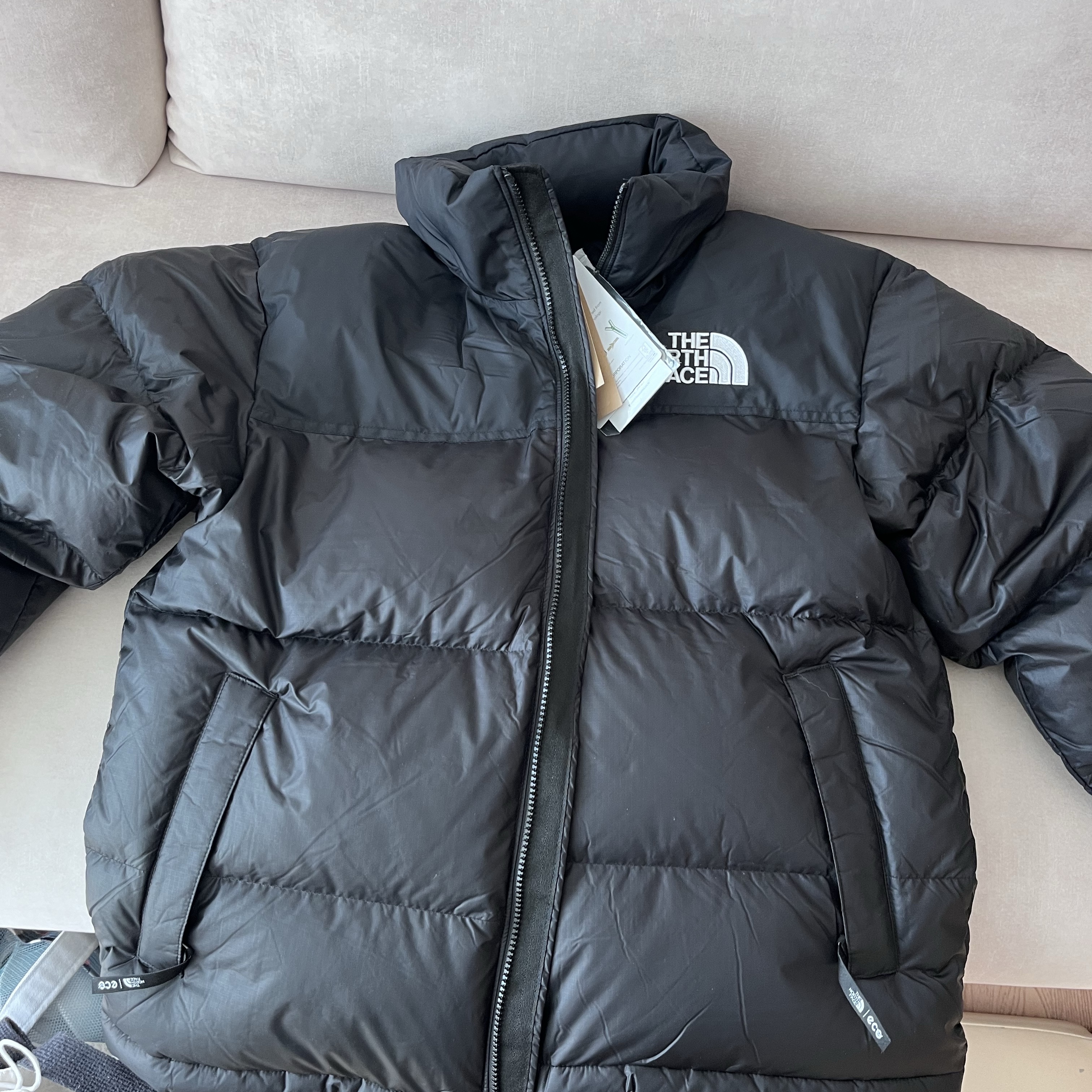 The North Face 1996 Eco Nuptse Jacket Black 착용 스타일