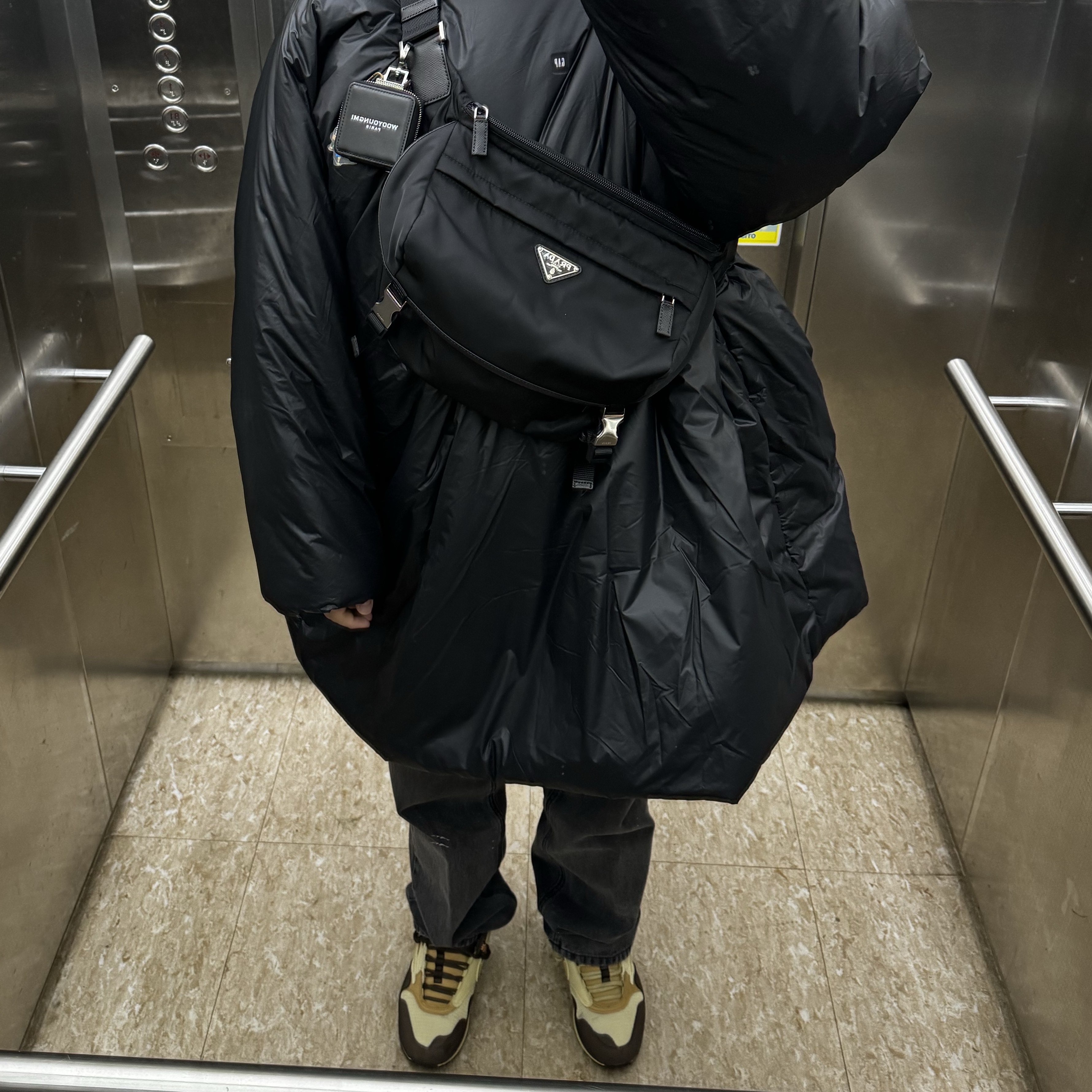 Nike x Travis Scott Air Max 1 Cact.us Brown, Prada Re-Nylon and Saffiano Leather Shoulder Bag Black 착용 스타일