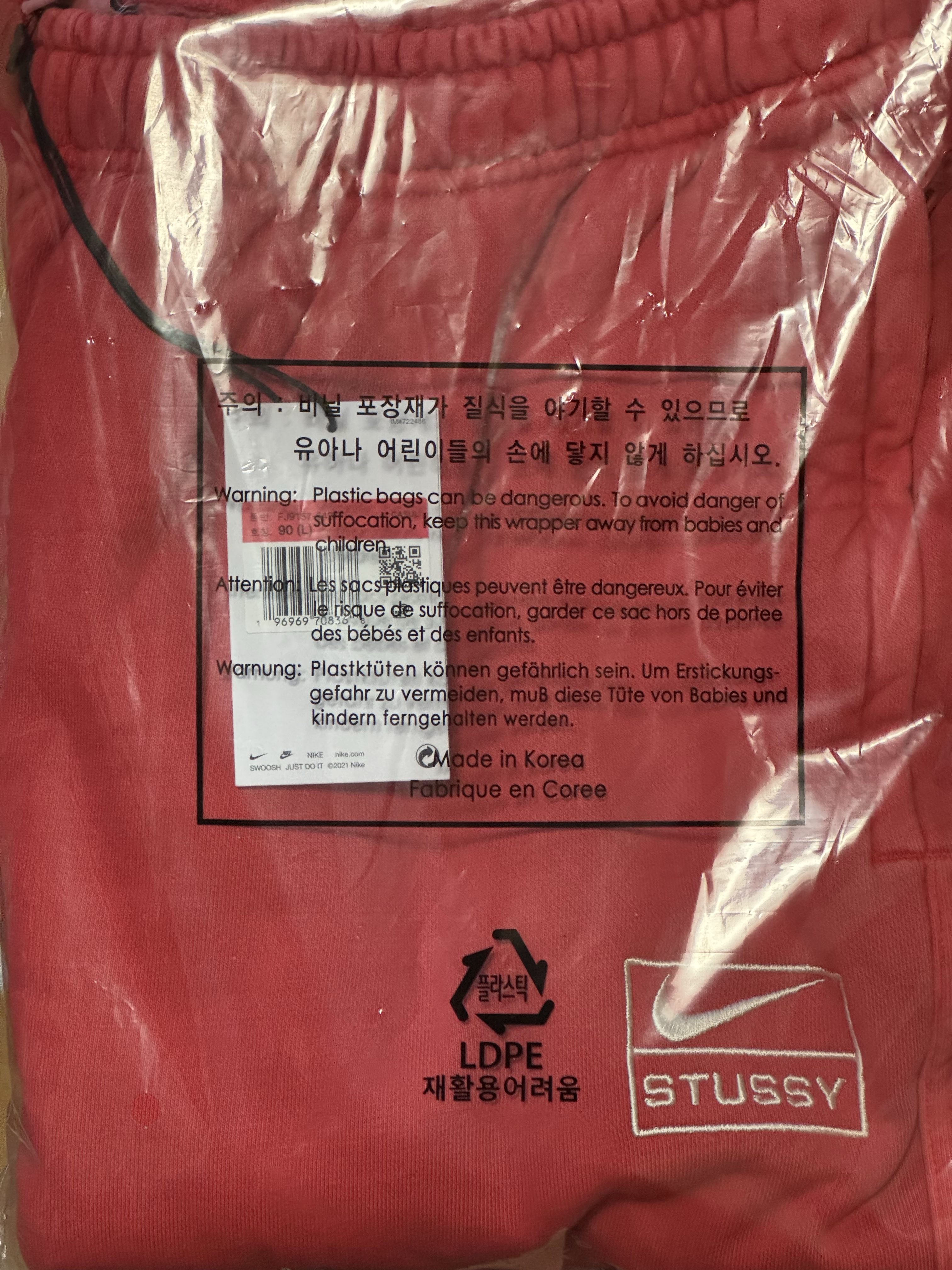 Nike x Stussy Pigment Dyed Fleece Pants Habanero Red (FJ9157-642) 착용 스타일