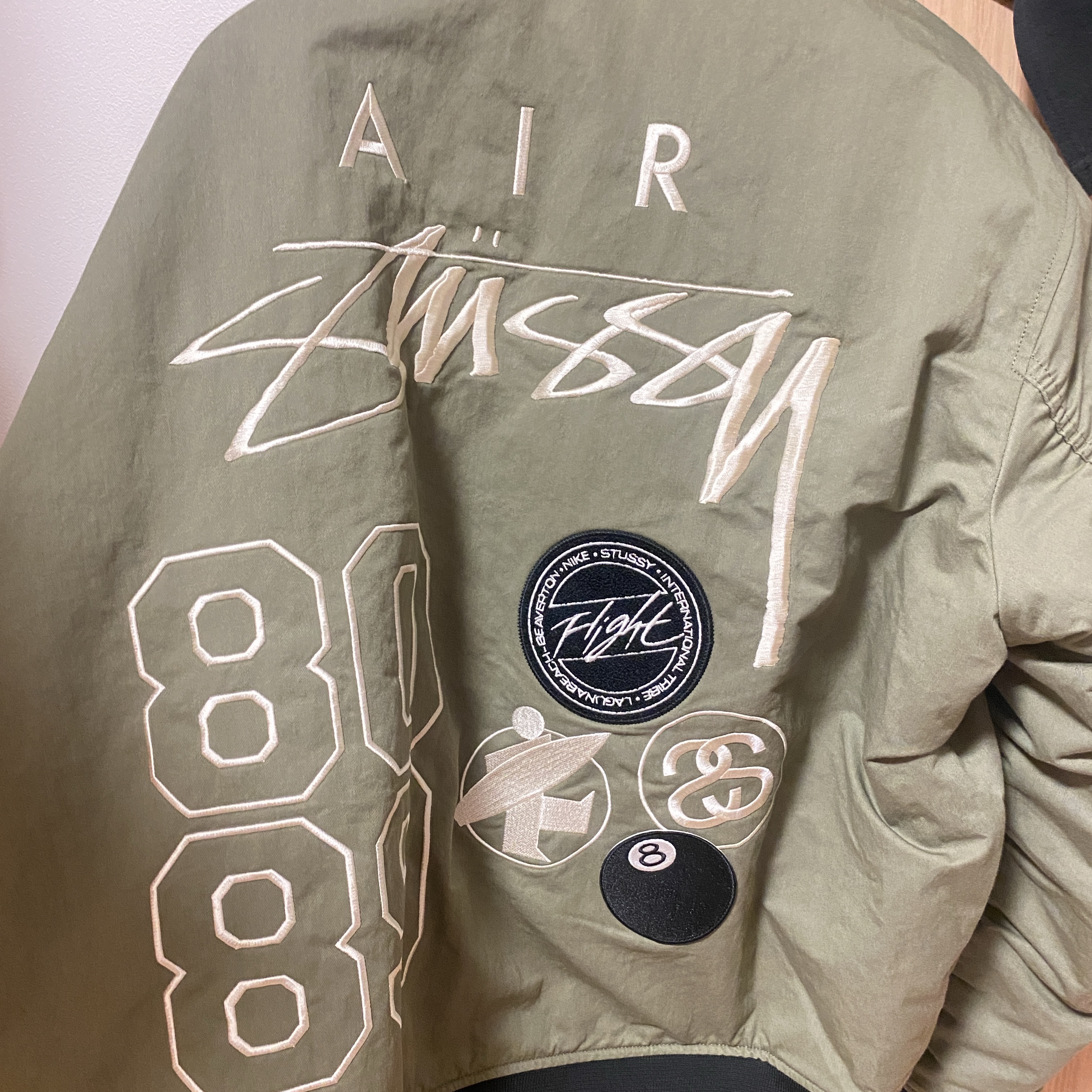 Nike x Stussy Reversible Jacket Medium Olive (FJ9154-222) 착용 스타일