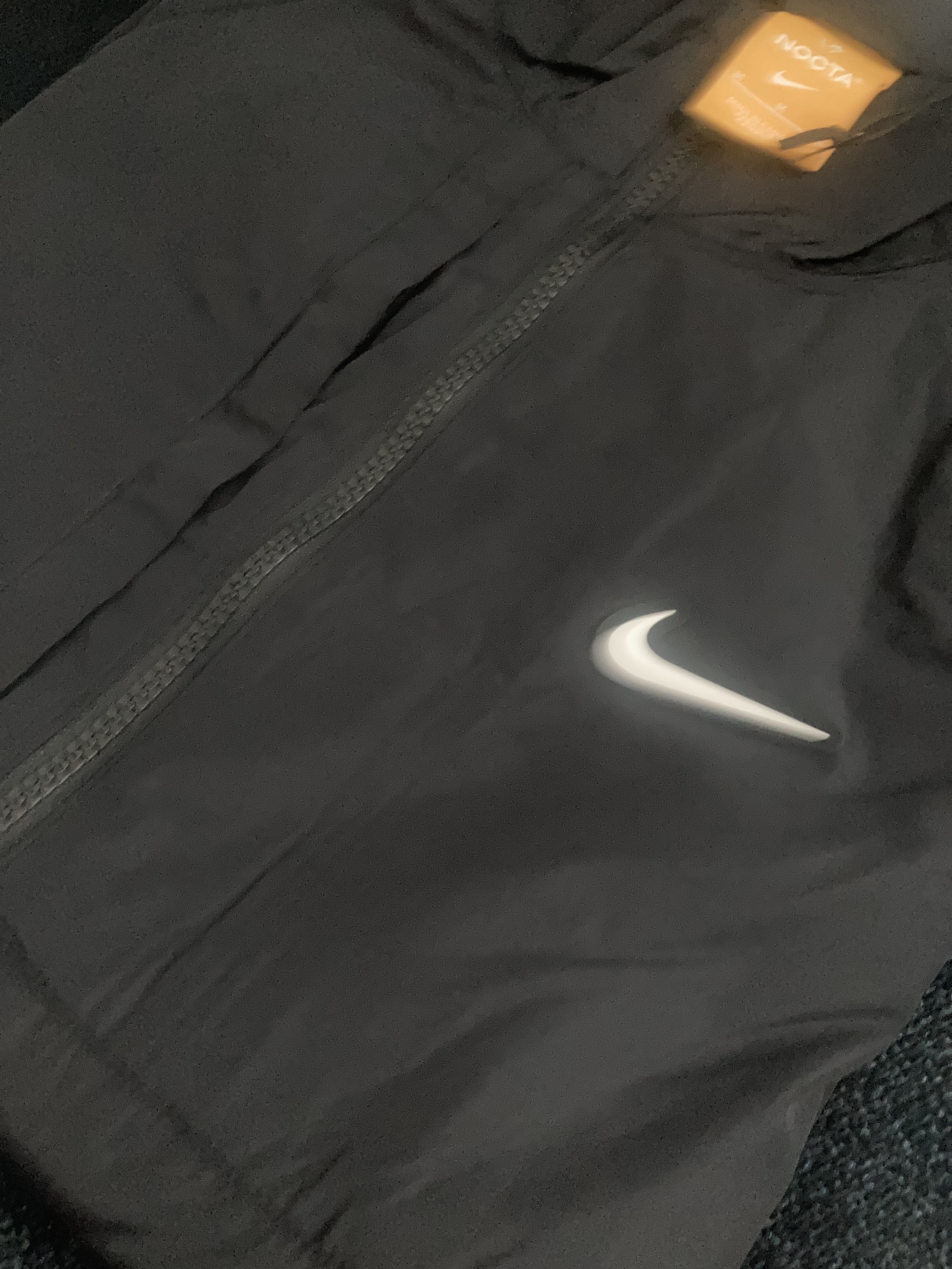 Nike x Drake Nocta Nylon Track Jacket Black (FN7666-010) 착용 스타일 - 3