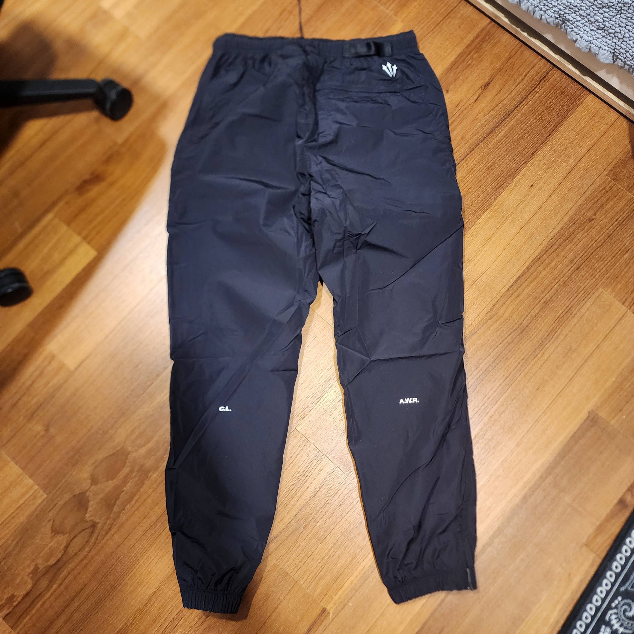 Nike x Drake Nocta Woven Track Pants Black (FN7668-010) 착용 스타일 - 2