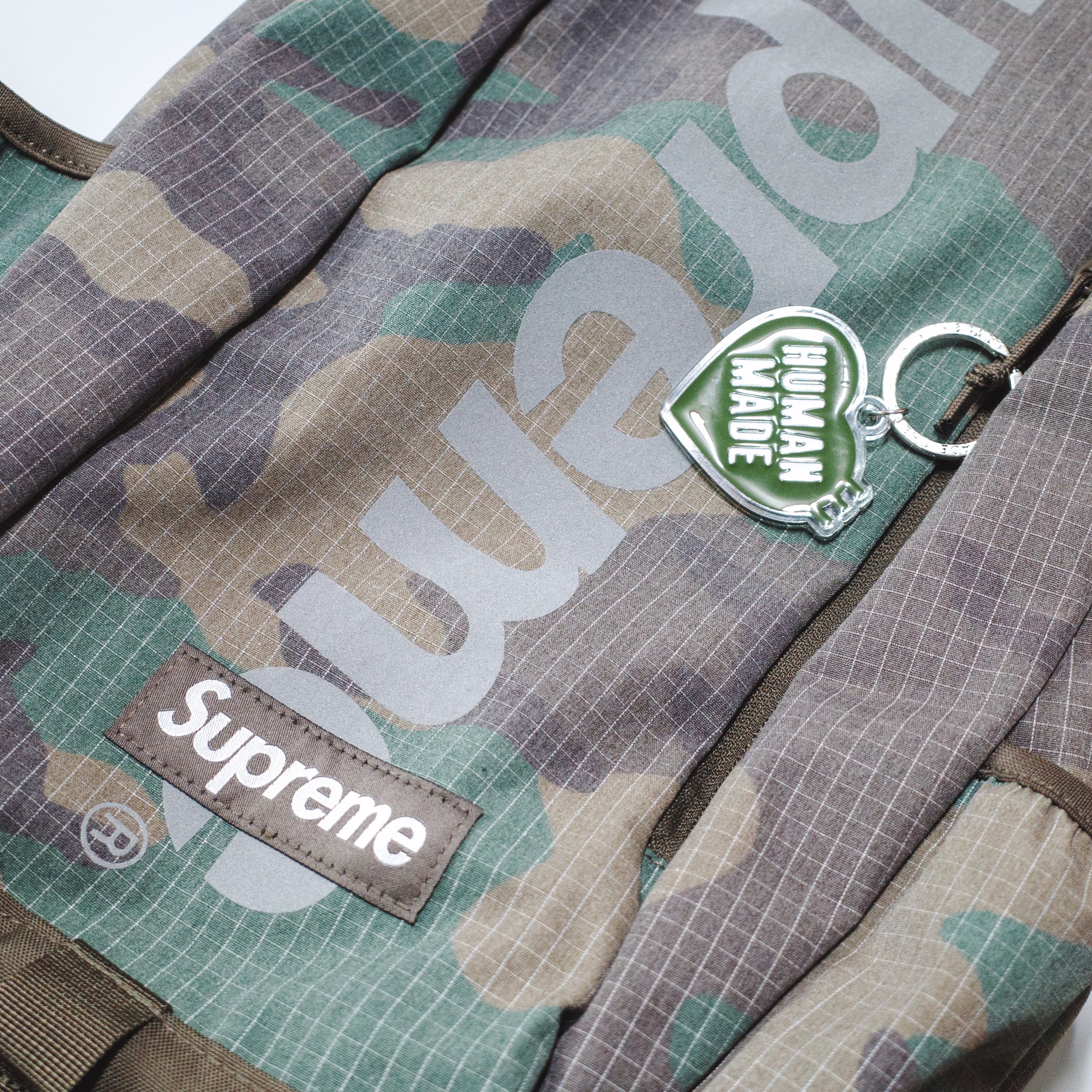 Supreme Backpack Woodland Camo - 24SS, Human Made Heart Keyring Olive Drab 착용 스타일