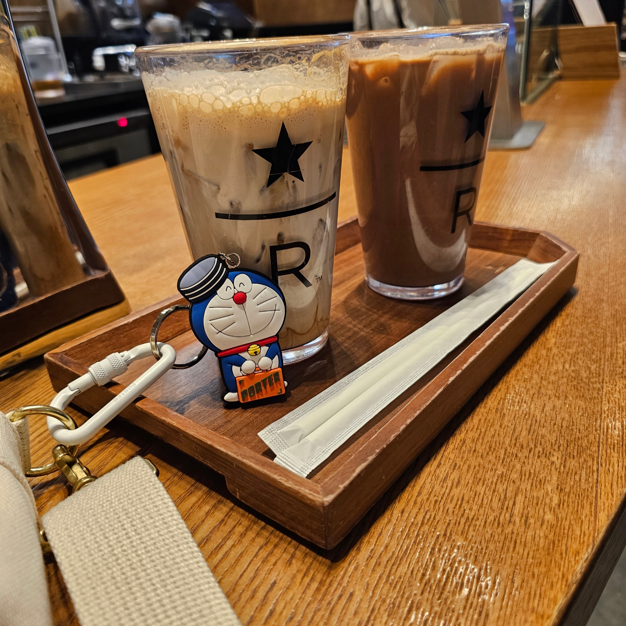 Porter x Doraemon Key Charm Front Orange 착용 스타일