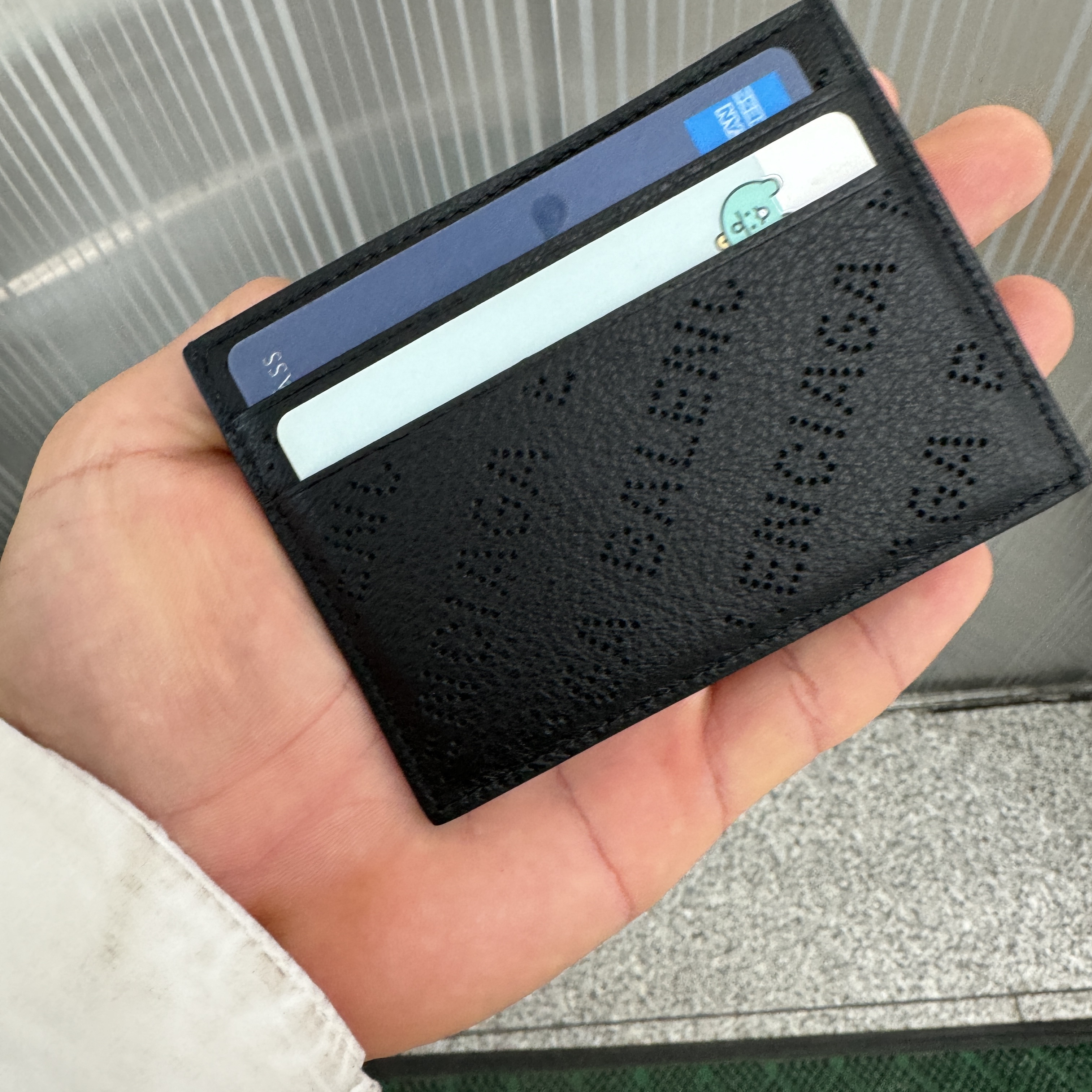 Balenciaga Logo Perforated Cash Card Holder Black, (W) Jordan 1 Low White Wolf Grey 착용 스타일