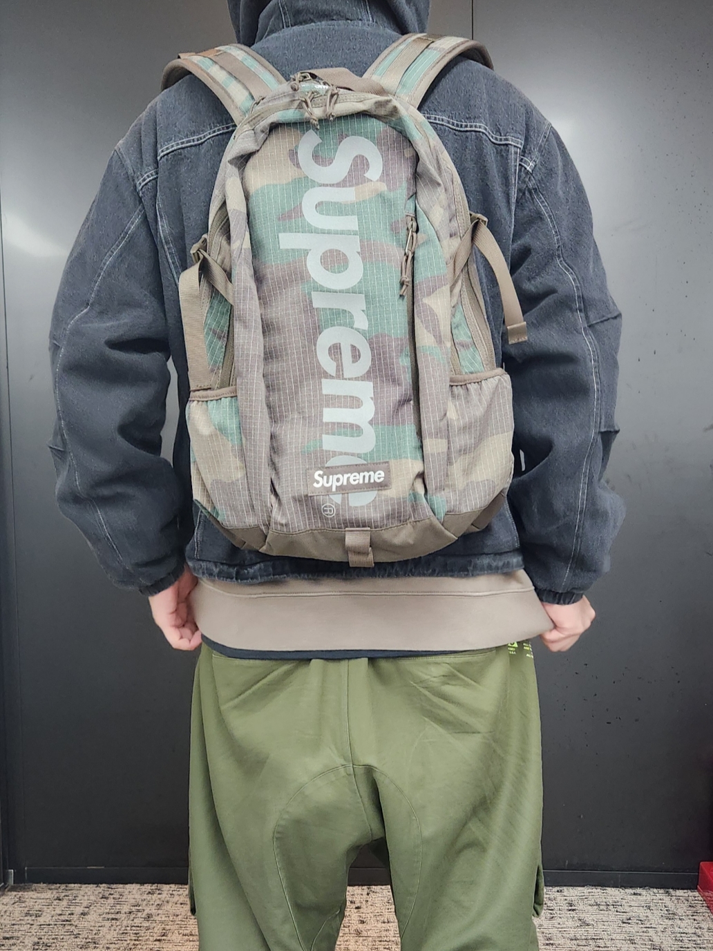 Supreme Backpack Woodland Camo - 24SS, Nike ACG Cargo Pants Black 착용 스타일
