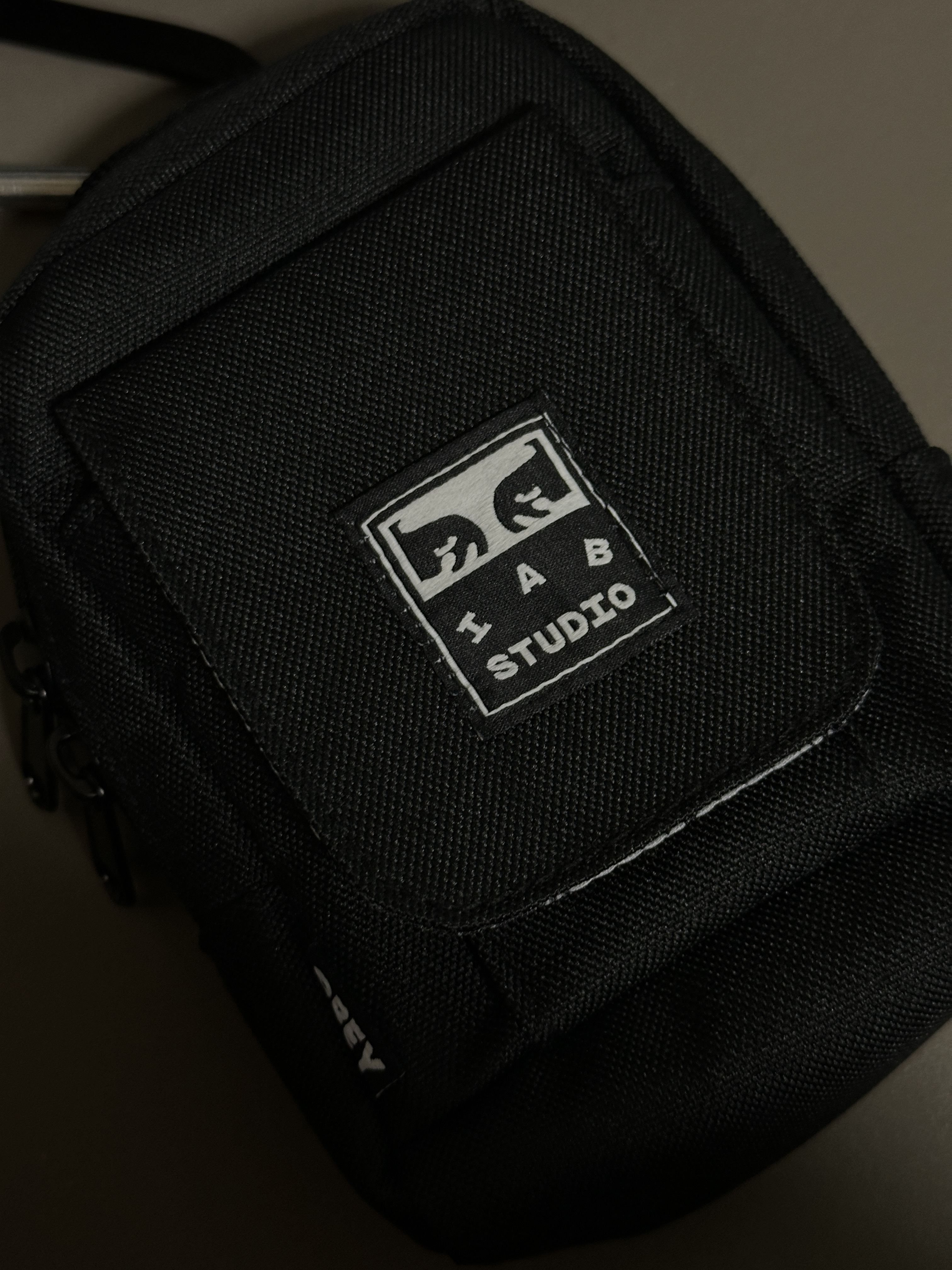 IAB Studio x Obey Drop Out Utility Small Bag Digital Black 착용 스타일