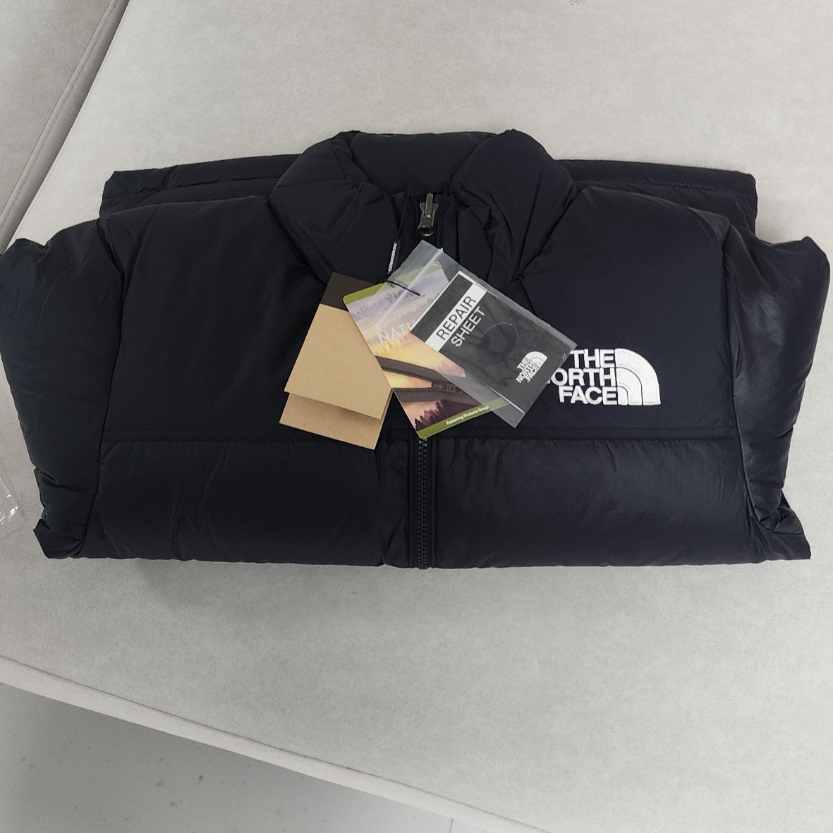 (W) The North Face 1996 Eco Nuptse Jacket Black 착용 스타일 - 2