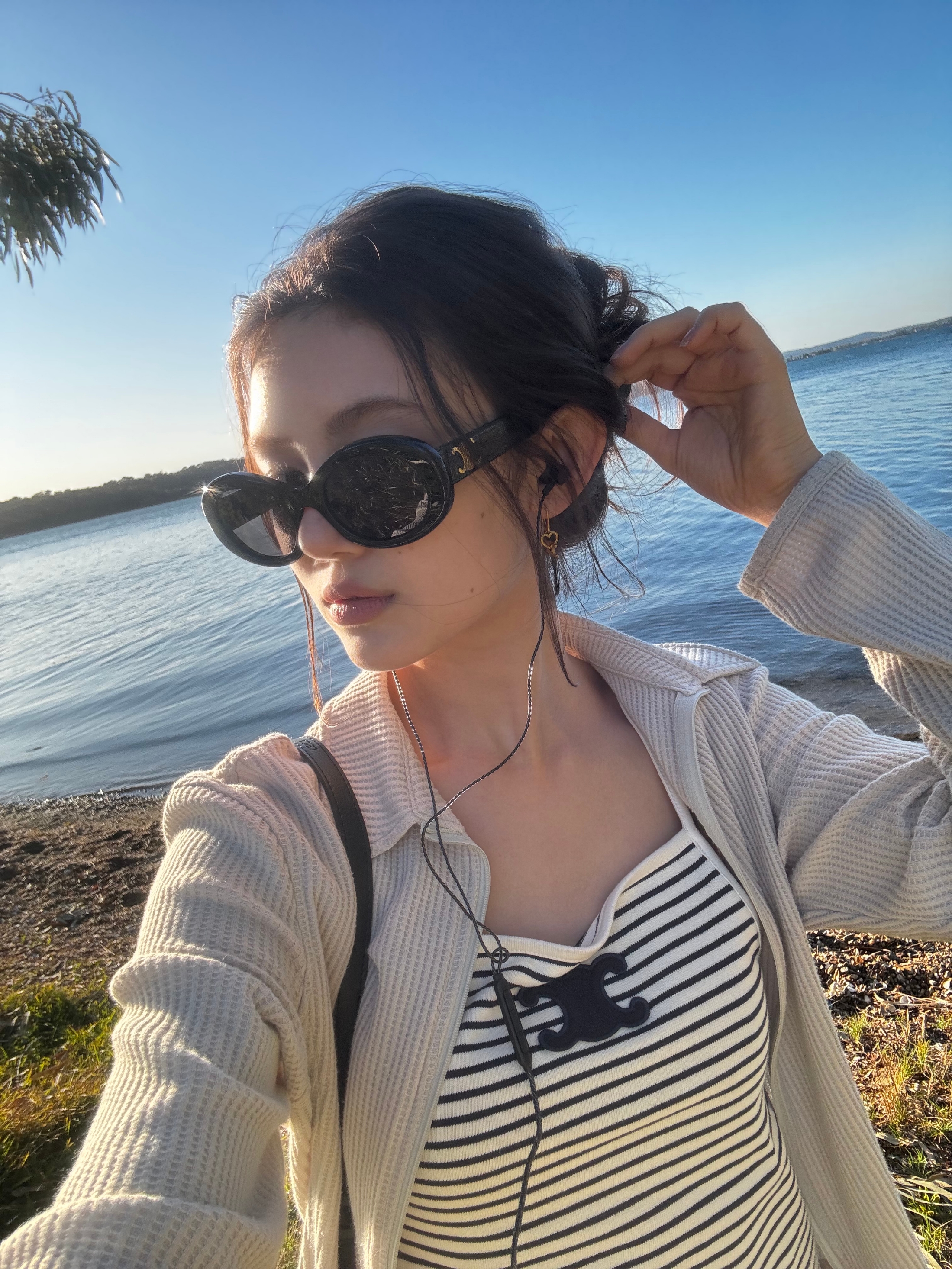 (W) Celine Triomphe Tank Top In Striped Jersey Off White Navy, (W) Celine Triomphe 01 Sunglasses in Acetate Black 착용 스타일 - 1