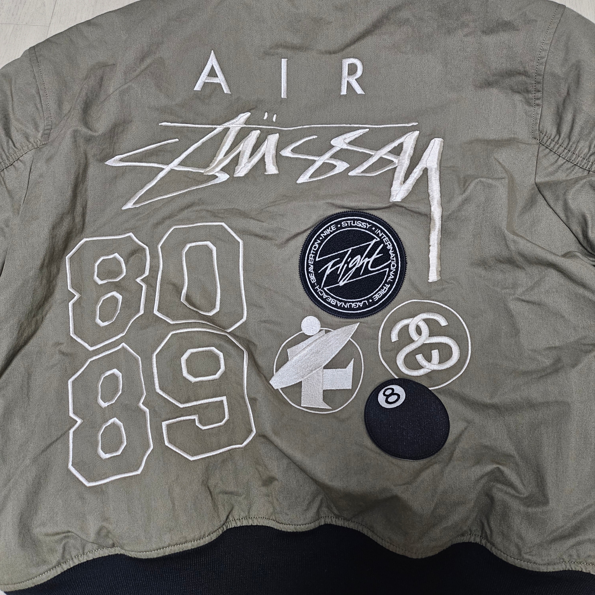 Nike x Stussy Reversible Jacket Medium Olive (FJ9153-222) 착용 스타일 - 1