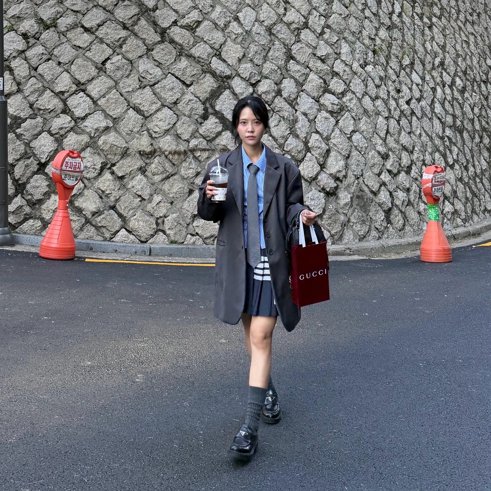 (W) Thom Browne Plain Weave Mini Pleated 4-Bar Skirt Navy, (W) Prada Chocolate Brushed Leather Loafers Black 착용 스타일 - 1