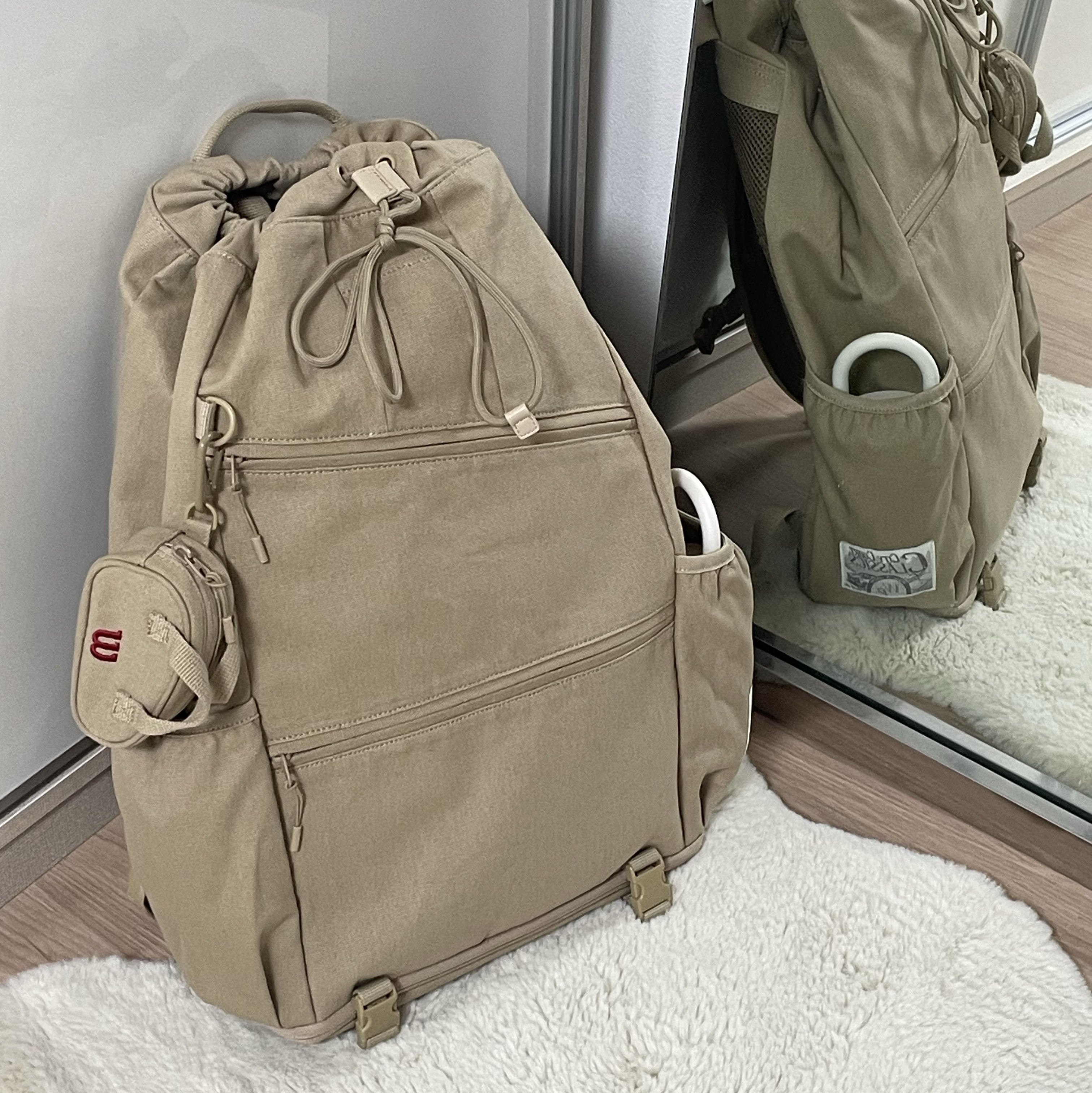 Wilson x PTRY Drawstring Backpack Brown 착용 스타일