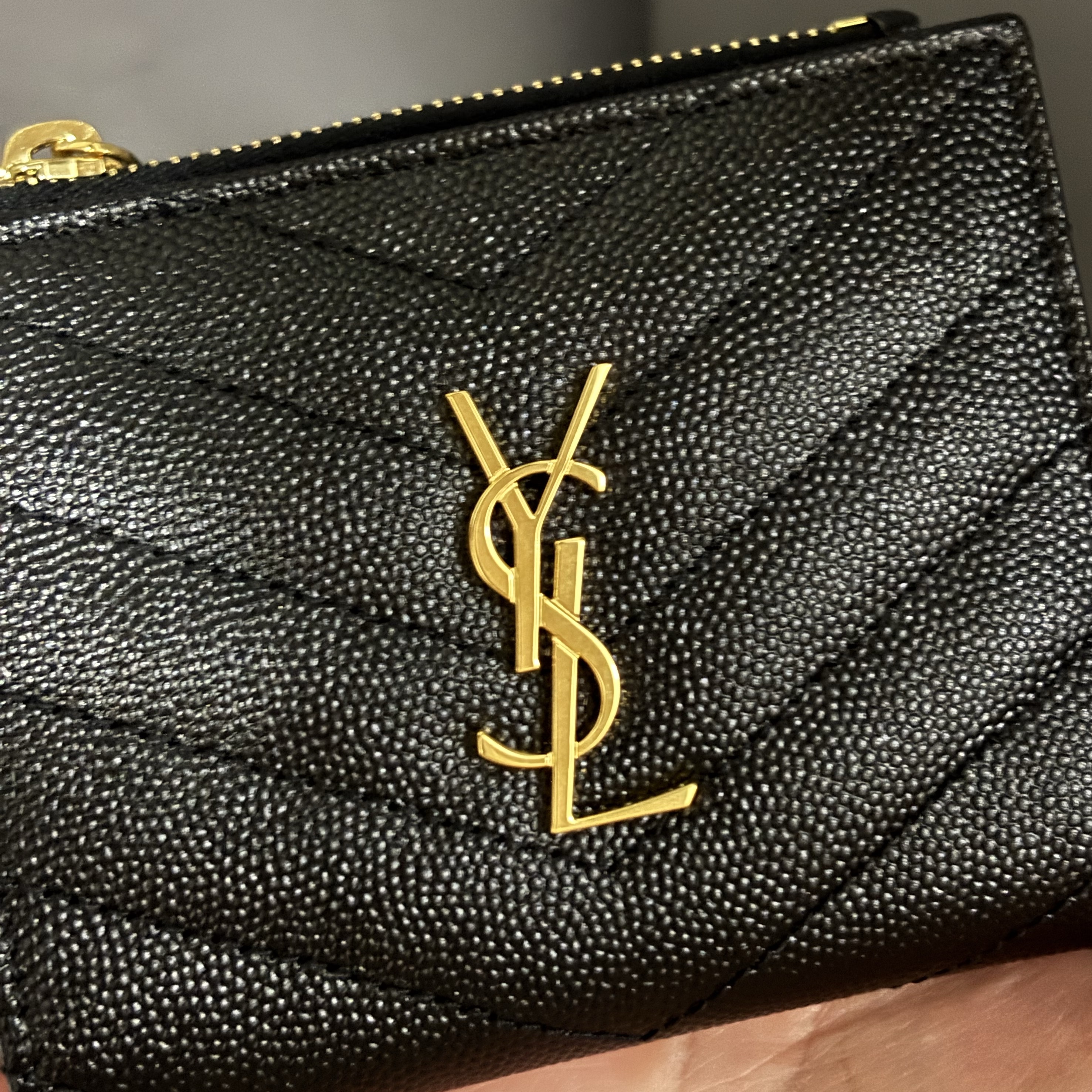 Saint Laurent Cassandre Matelasse Bi-fold Wallet in Grain de Poudre Embossed Leather Black 착용 스타일
