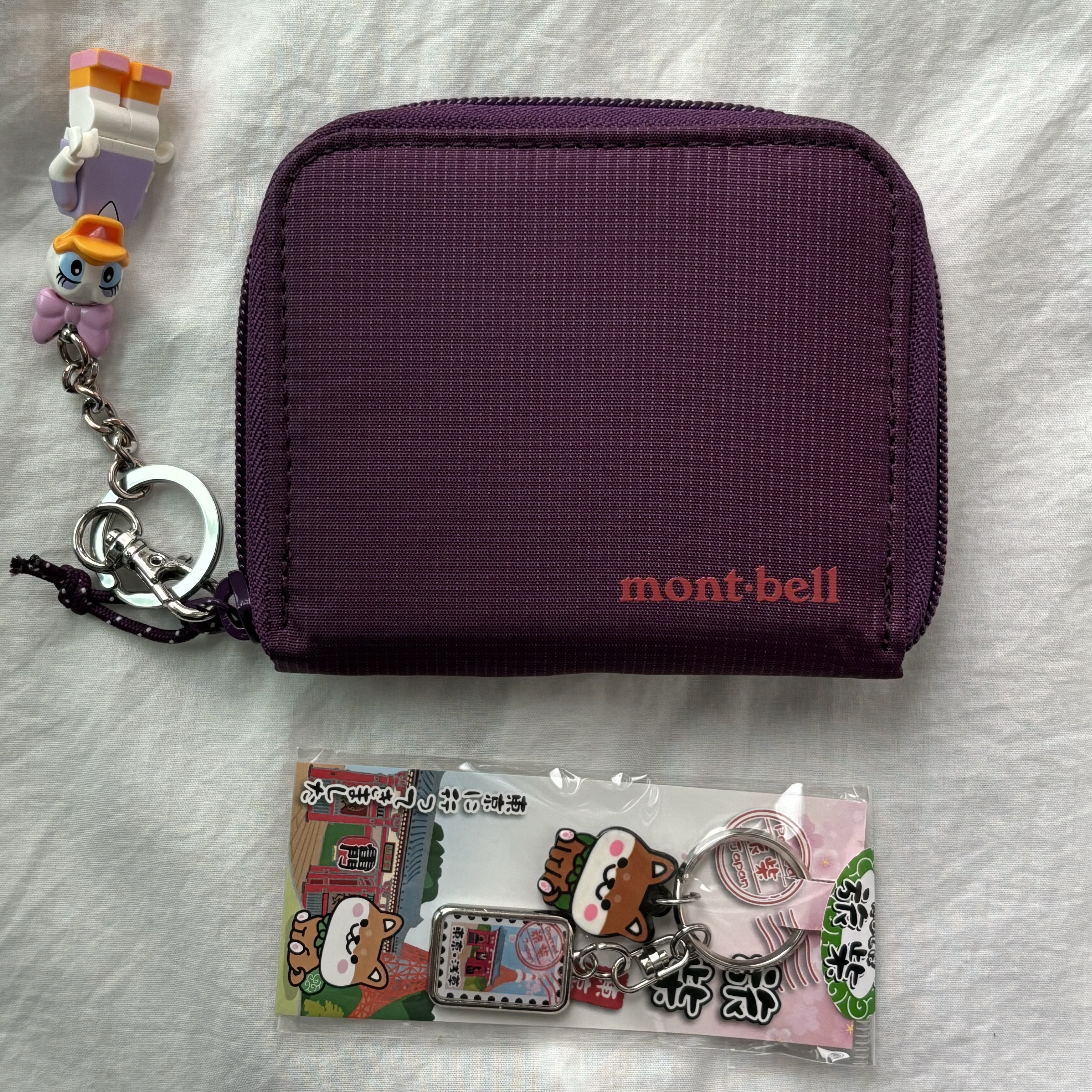 Montbell Zip Wallet Purple 착용 스타일