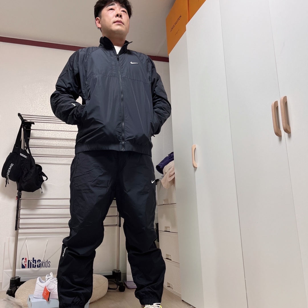Nike x Drake Nocta Woven Track Pants Black (FN7668-010), Nike x Drake Nocta Nylon Track Jacket Black (FN7666-010) 착용 스타일 - 3