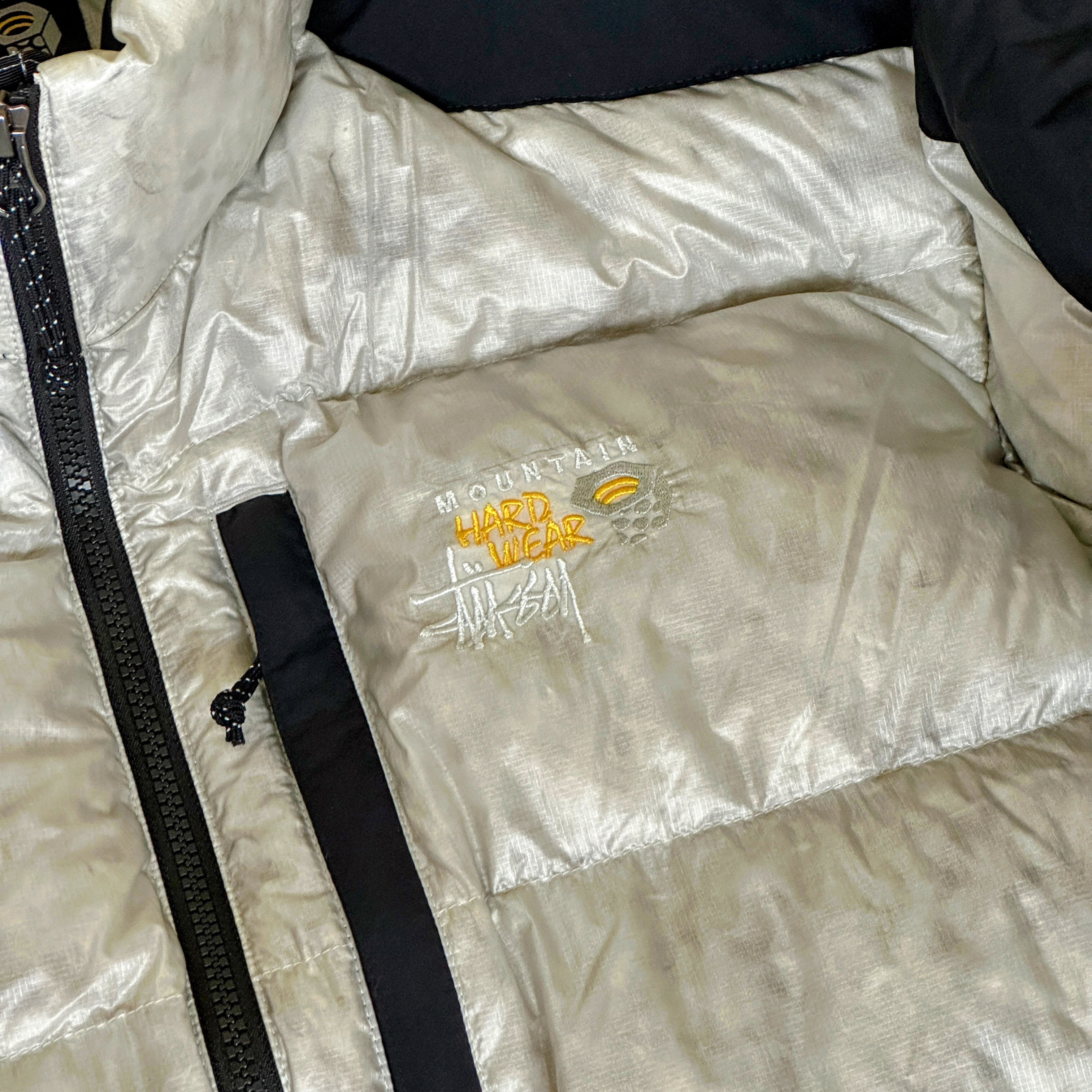 Stussy x Mountain Hardwear Subzero Down Jacket Moonshot Grey Black 착용 스타일