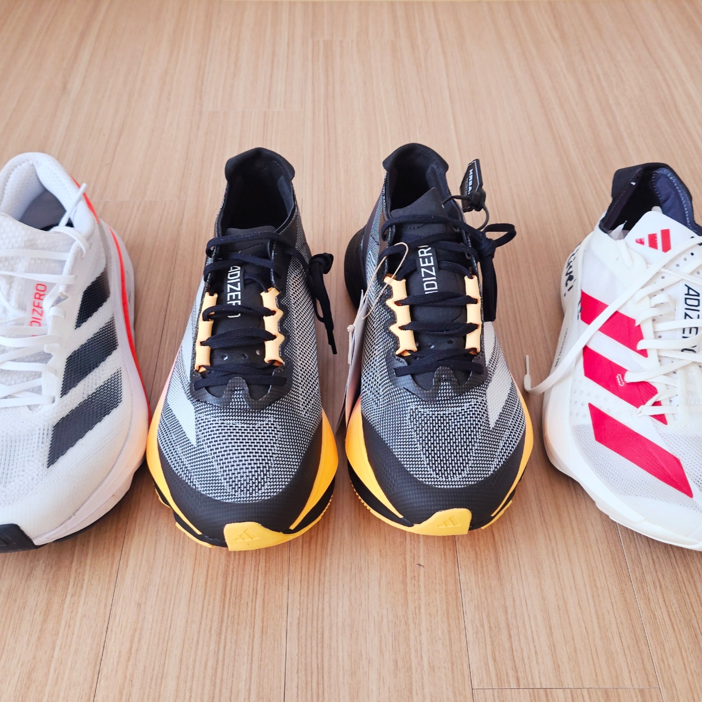 Adidas Adizero Boston 12 Core Black Zero Metalic 착용 스타일 - 2