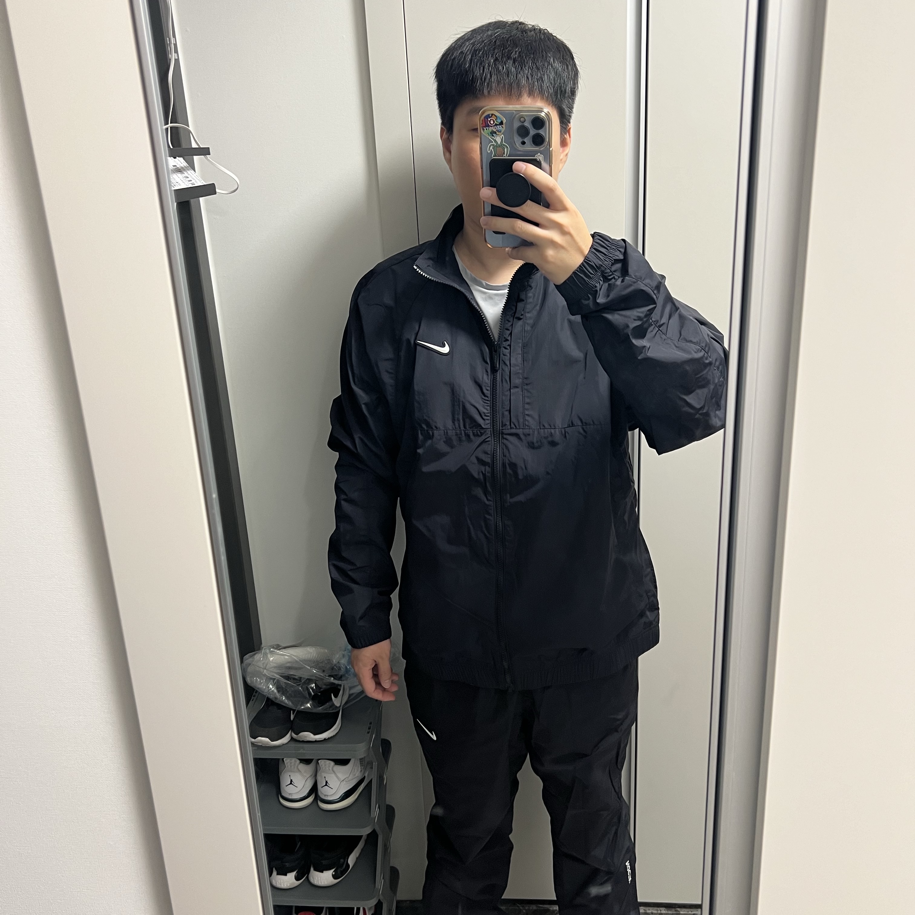 Nike x Drake Nocta Nylon Track Jacket Black (FN7666-010) 착용 스타일
