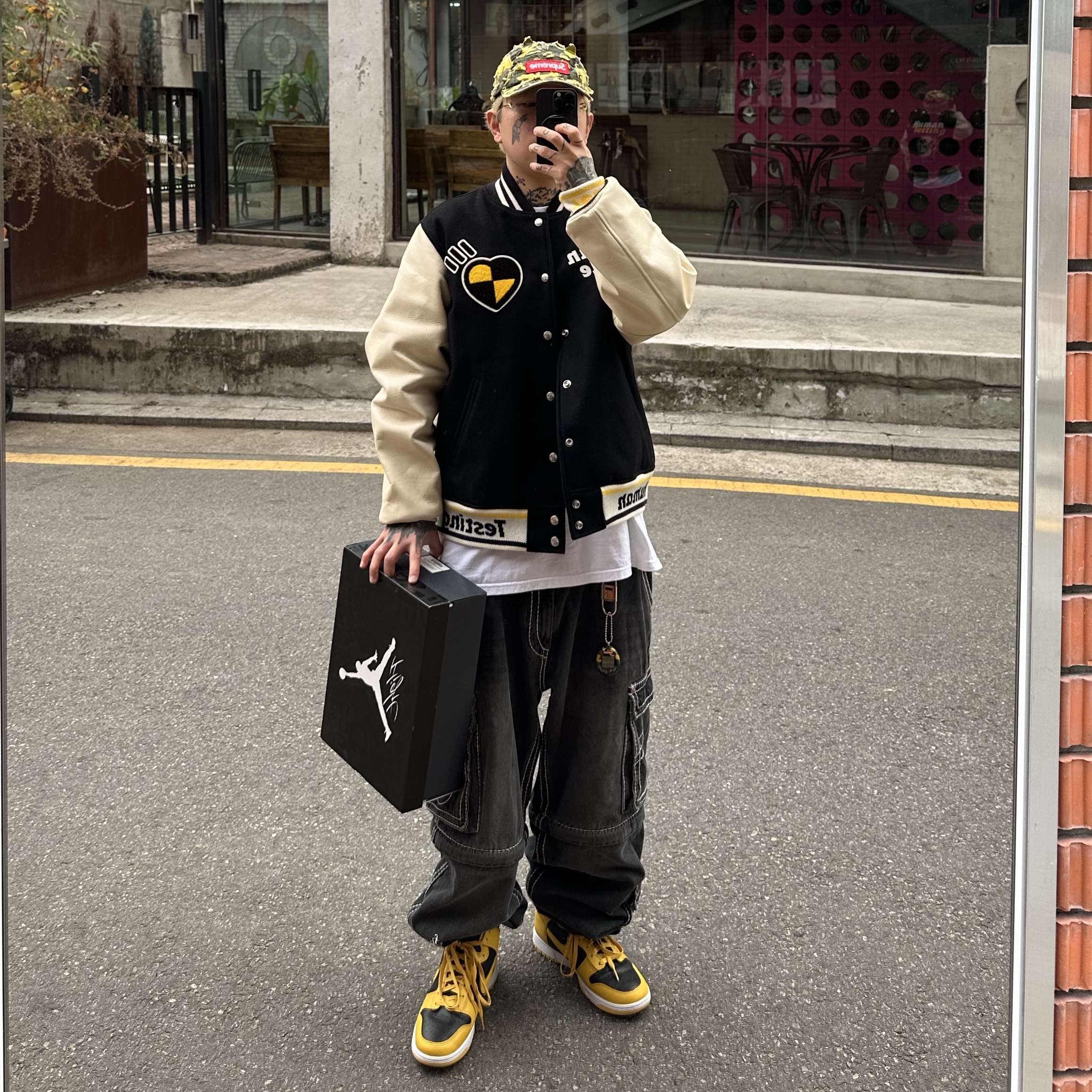 Human Made x A$AP Rocky Human Testing Varsity Jacket Black, Supreme Griffin Camp Cap Yellow Camo - 22FW 착용 스타일 - 1