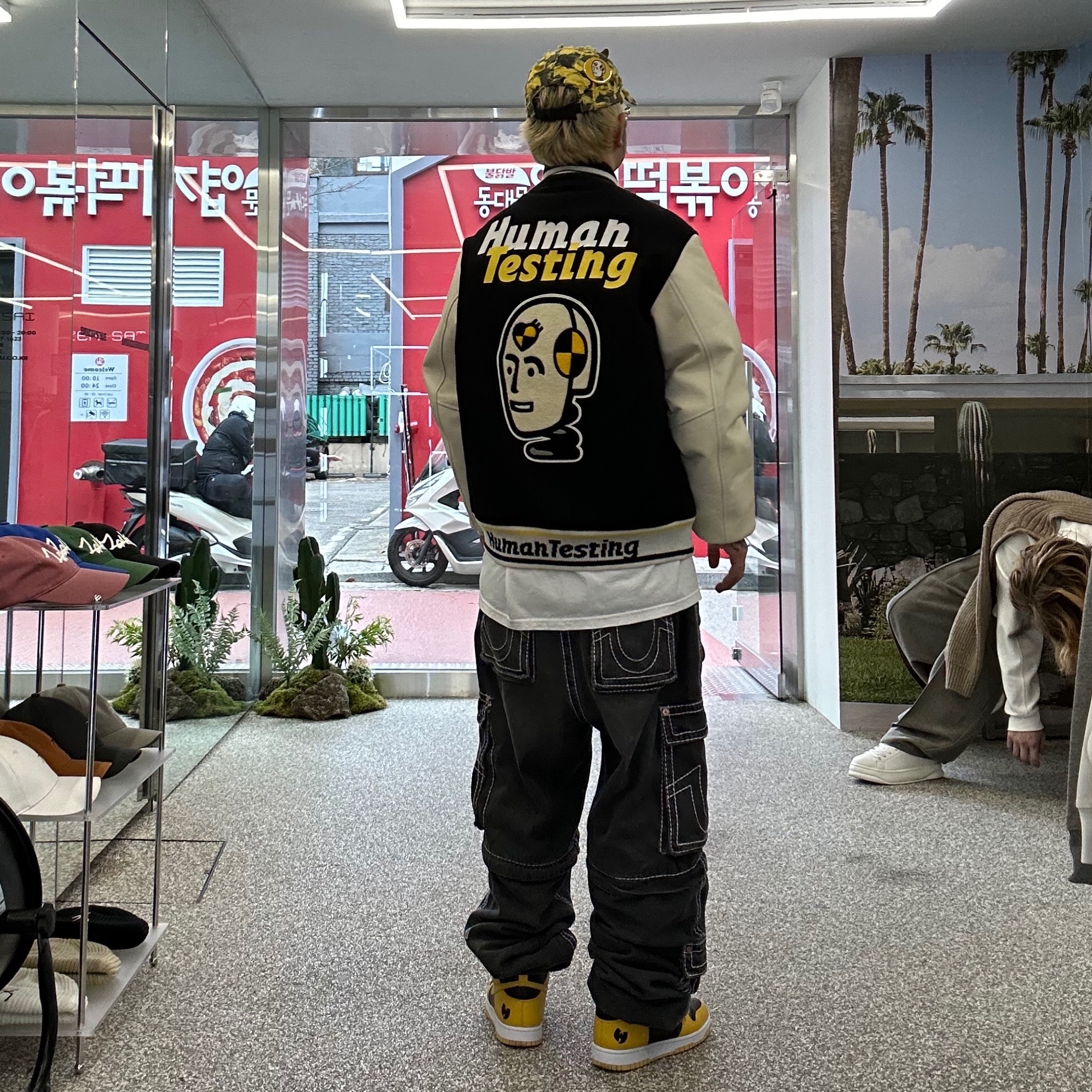 Human Made x A$AP Rocky Human Testing Varsity Jacket Black, Supreme Griffin Camp Cap Yellow Camo - 22FW 착용 스타일 - 3
