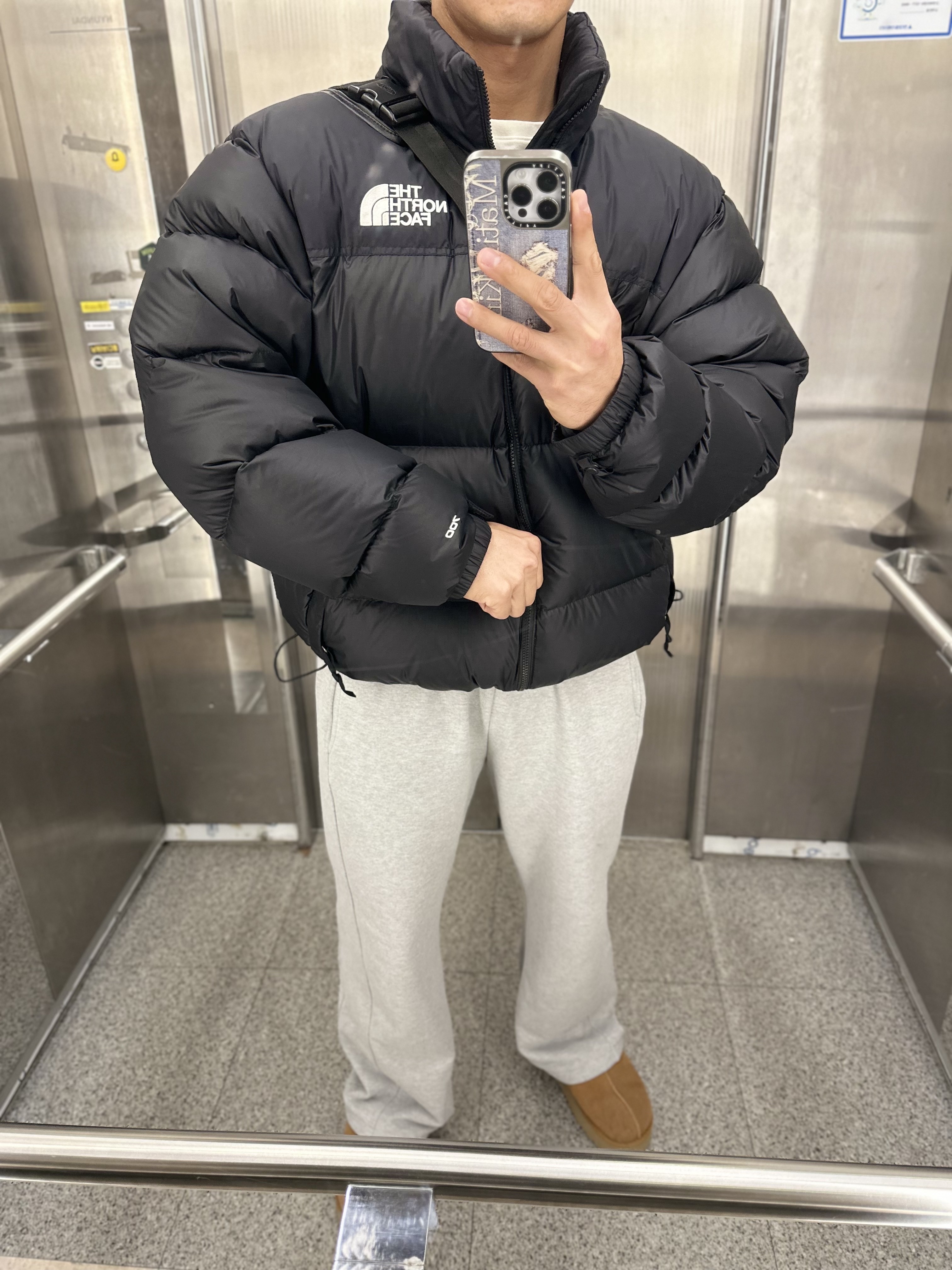 The North Face 1996 Retro Nuptse Down Jacket TNF Black, Casetify x Matin Kim iPhone Destroyed Denim Magsafe Mirror Case Silver 착용 스타일