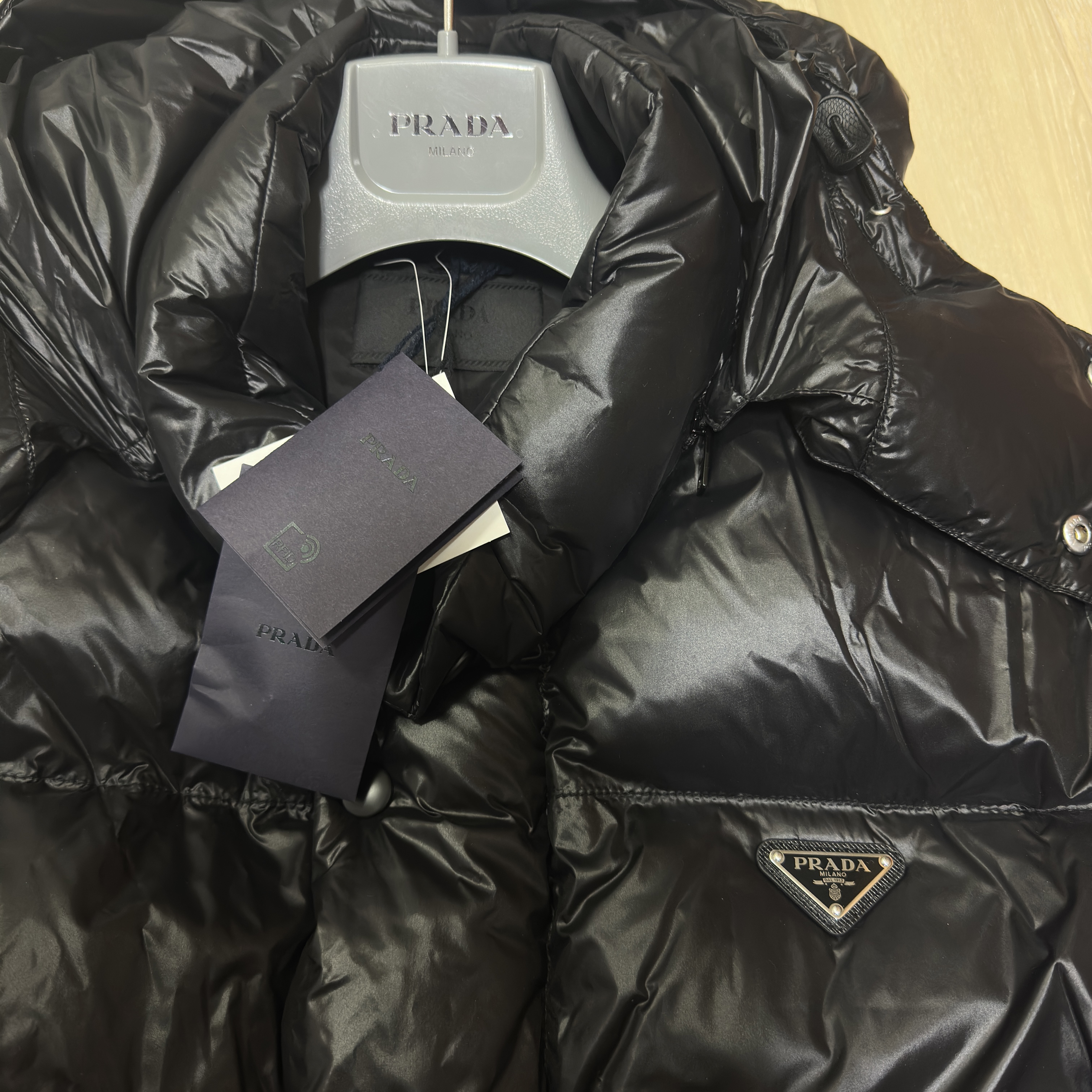 Prada Re-Nylon Down Coat Black 착용 스타일