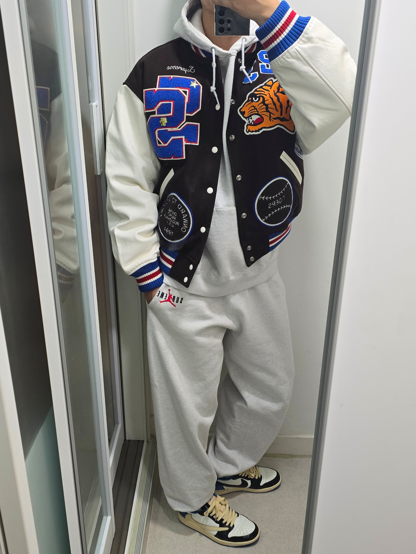 Supreme Tiger Varsity Jacket Brown - 23FW, Supreme x Jordan Hooded Sweatshirt Ash Grey - 24FW 착용 스타일