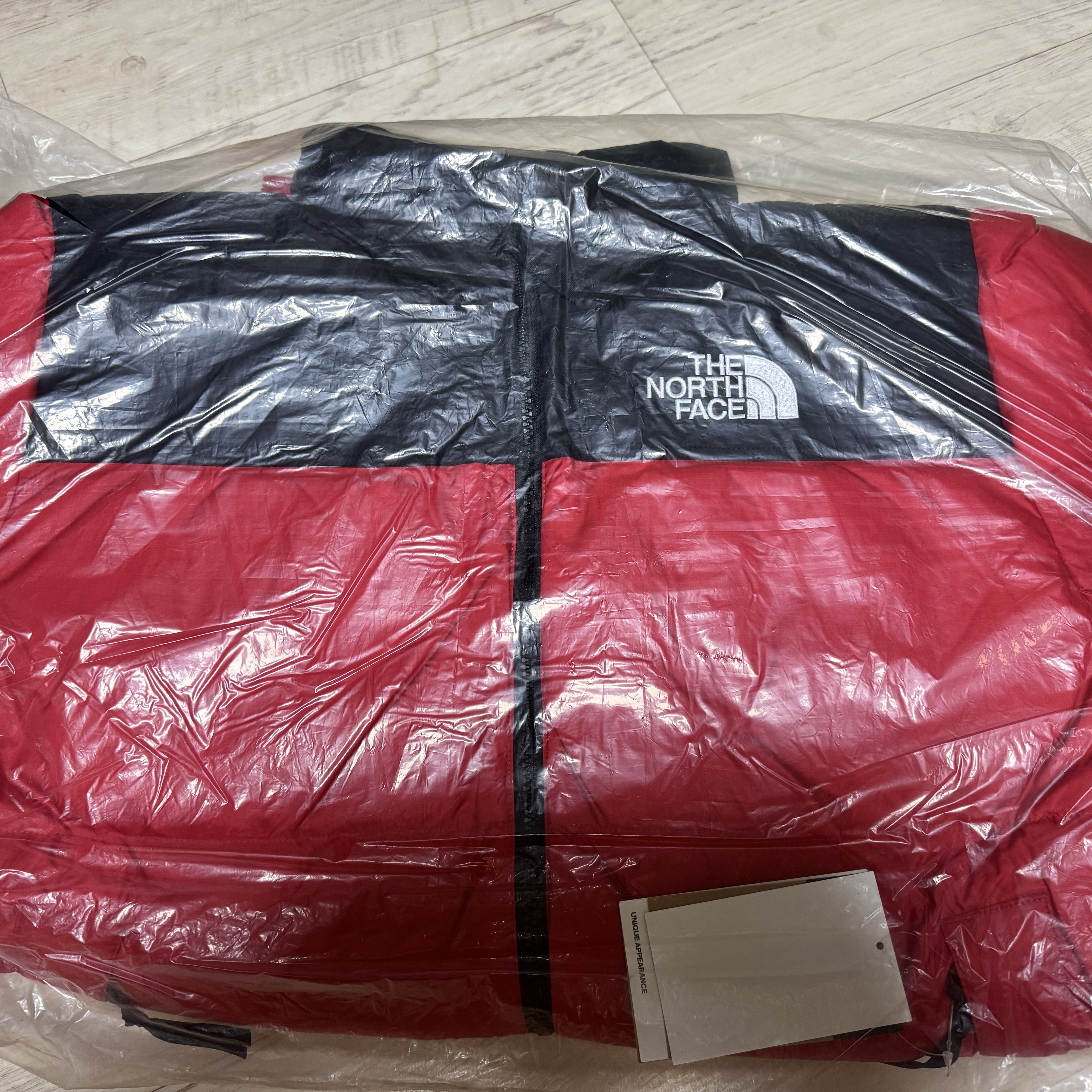 Supreme x The North Face Nuptse Jacket Red - 24FW 착용 스타일