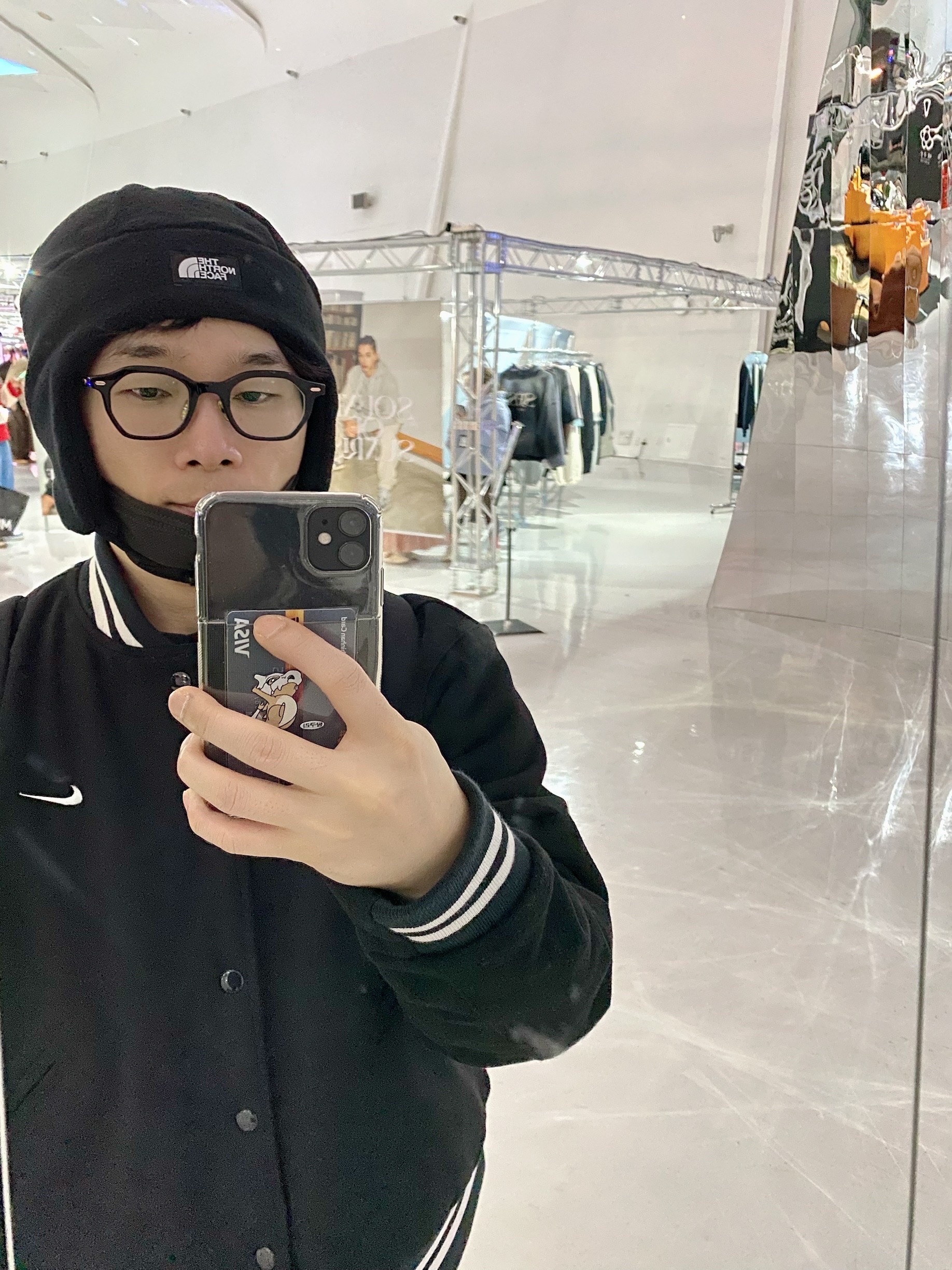 The North Face Fleece Earmuff Beanie Black, Nike NSW Authentics Varsity Jacket Black - Asia 착용 스타일