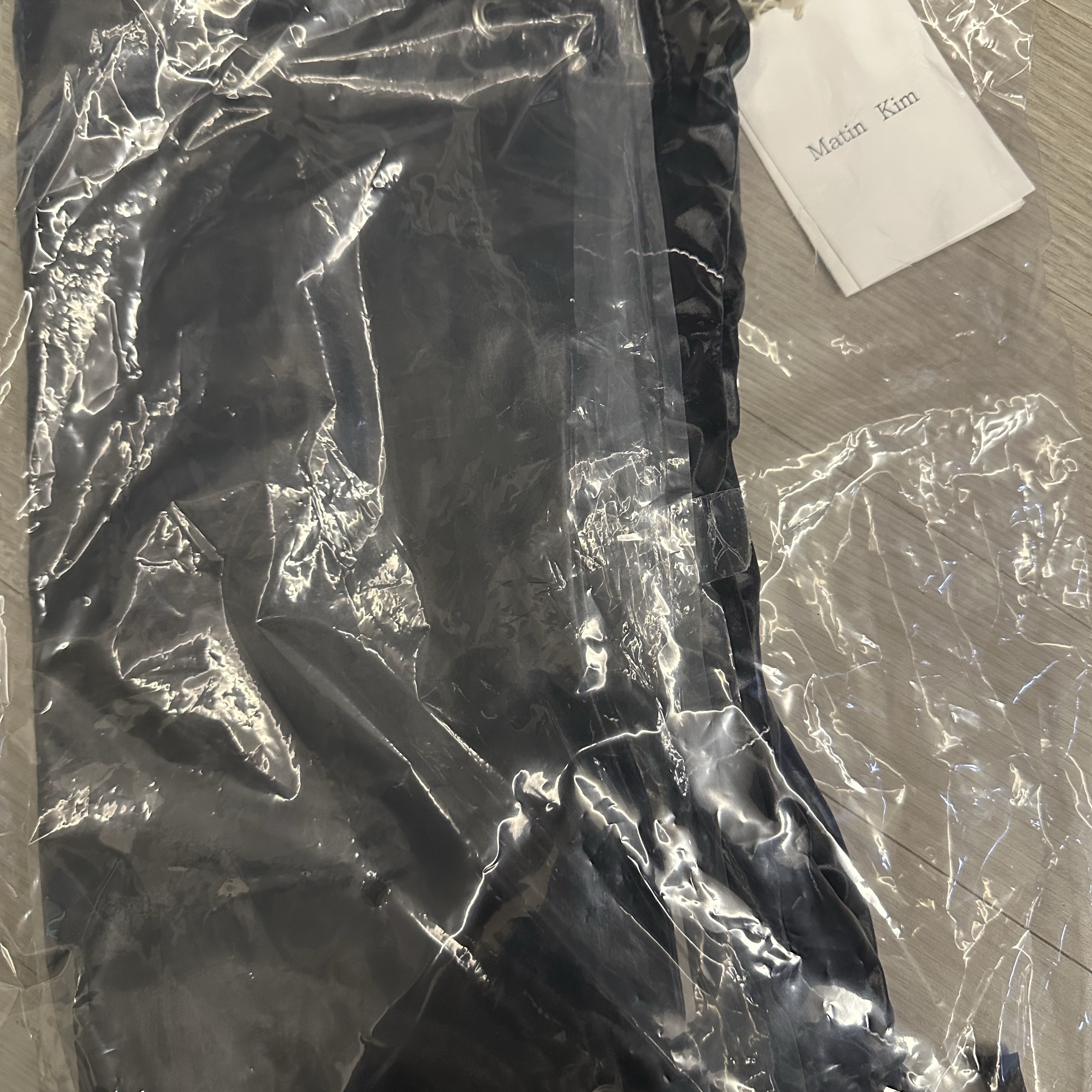 Matin Kim String Coating Backpack Black 착용 스타일