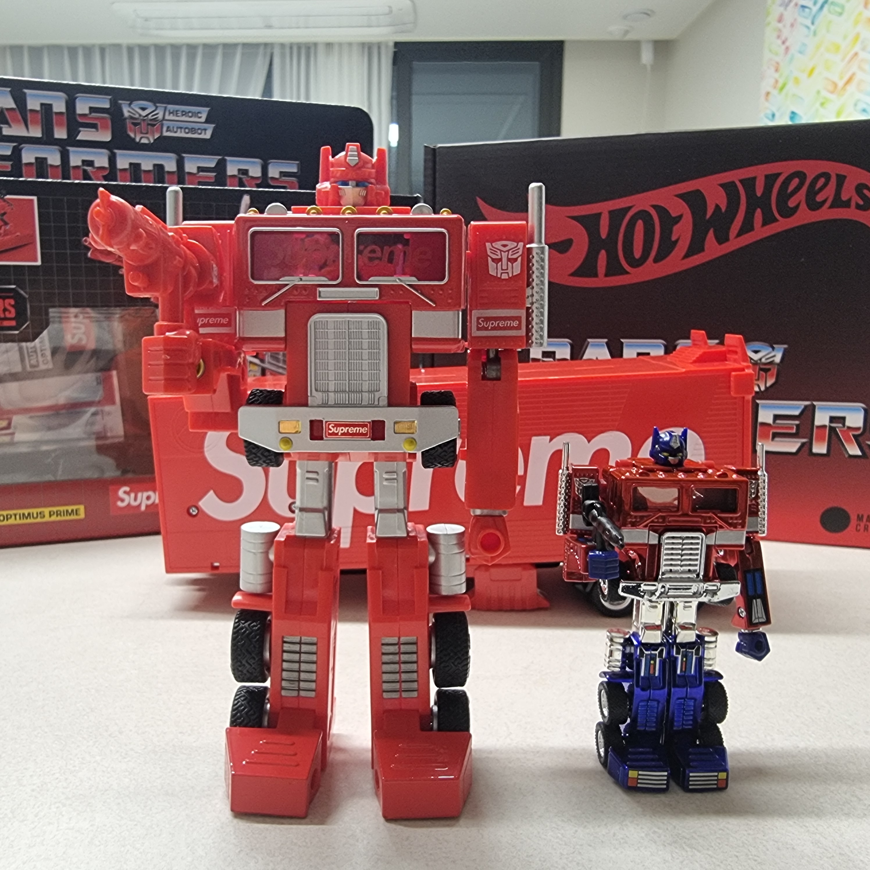 Supreme x Transformers G1 Optimus Prime Figure Red - 25SS (Korean Ver.) 착용 스타일 - 3