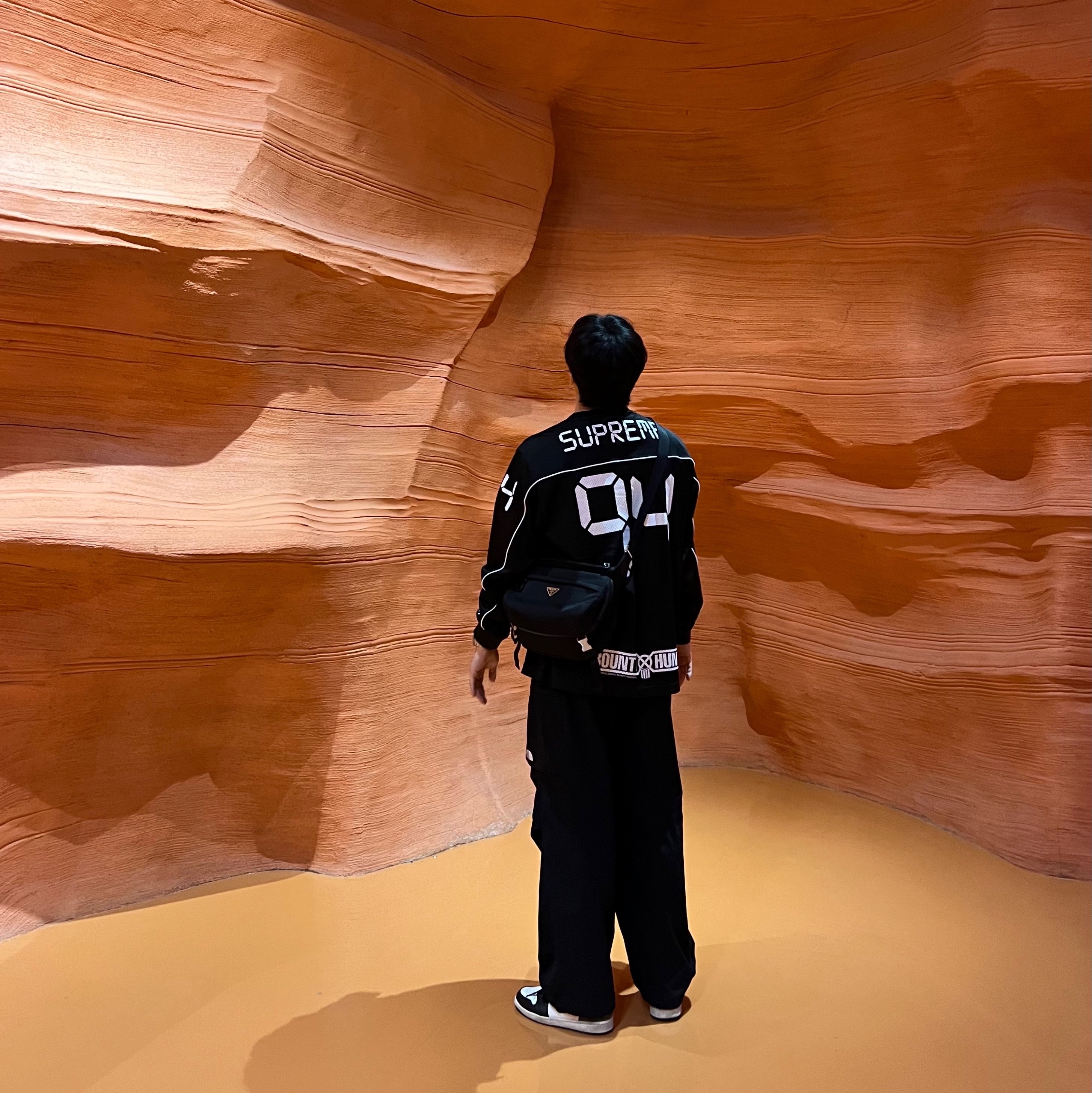 Supreme x Bounty Hunter Mesh Moto Jersey Black - 23FW, Prada Re-Nylon and Saffiano Leather Shoulder Bag Black 착용 스타일