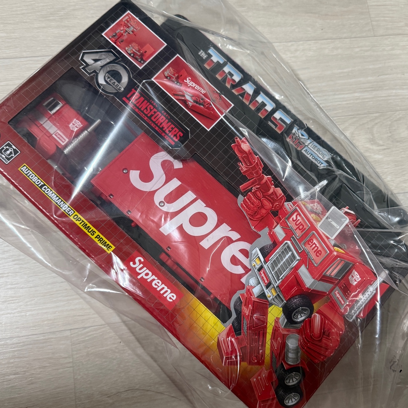 Supreme x Transformers G1 Optimus Prime Figure Red - 25SS 착용 스타일