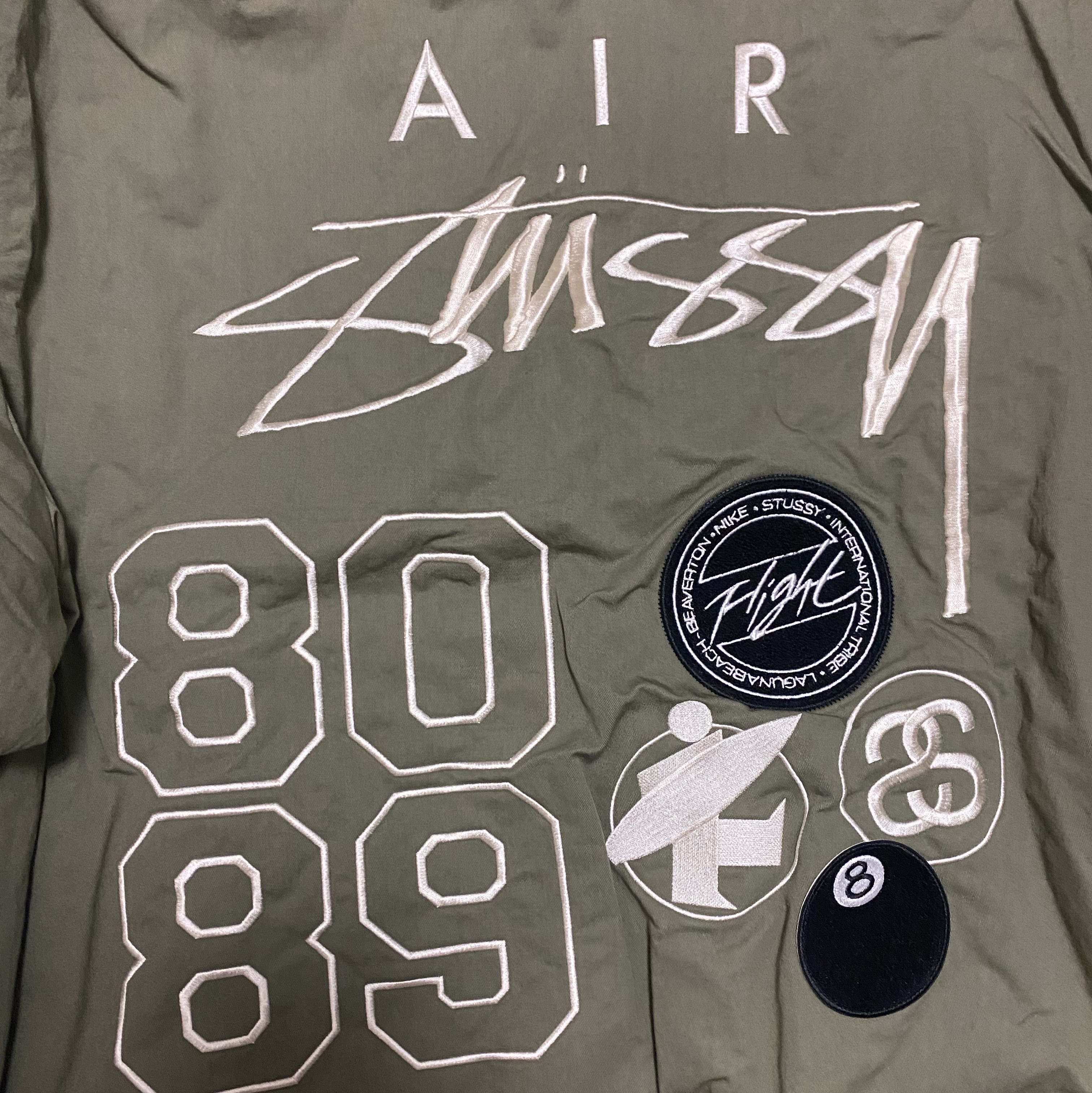 Nike x Stussy Reversible Jacket Medium Olive (FJ9153-222) 착용 스타일