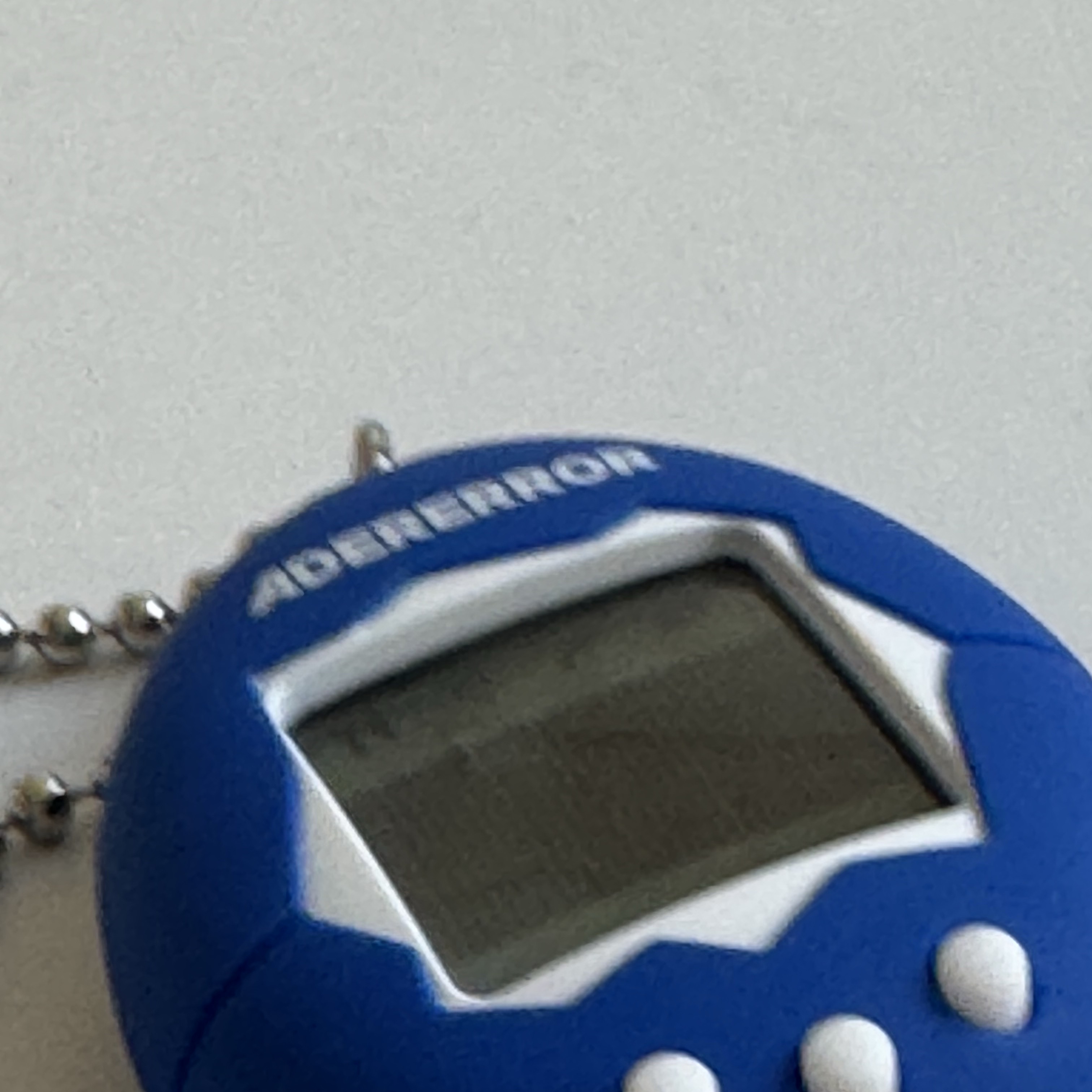 Ader Error x Bandai Original Tamagotchi Z-Blue 착용 스타일