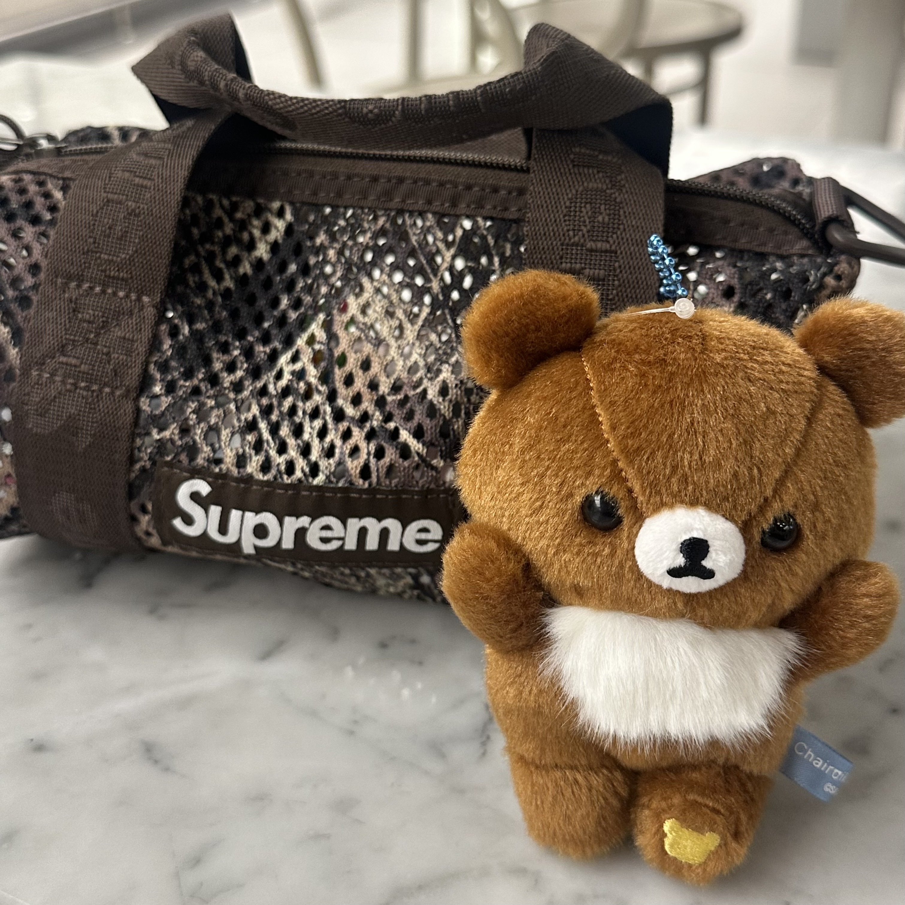 Supreme Mesh Mini Duffle Bag Truetimber Kanati Camo - 25SS 착용 스타일
